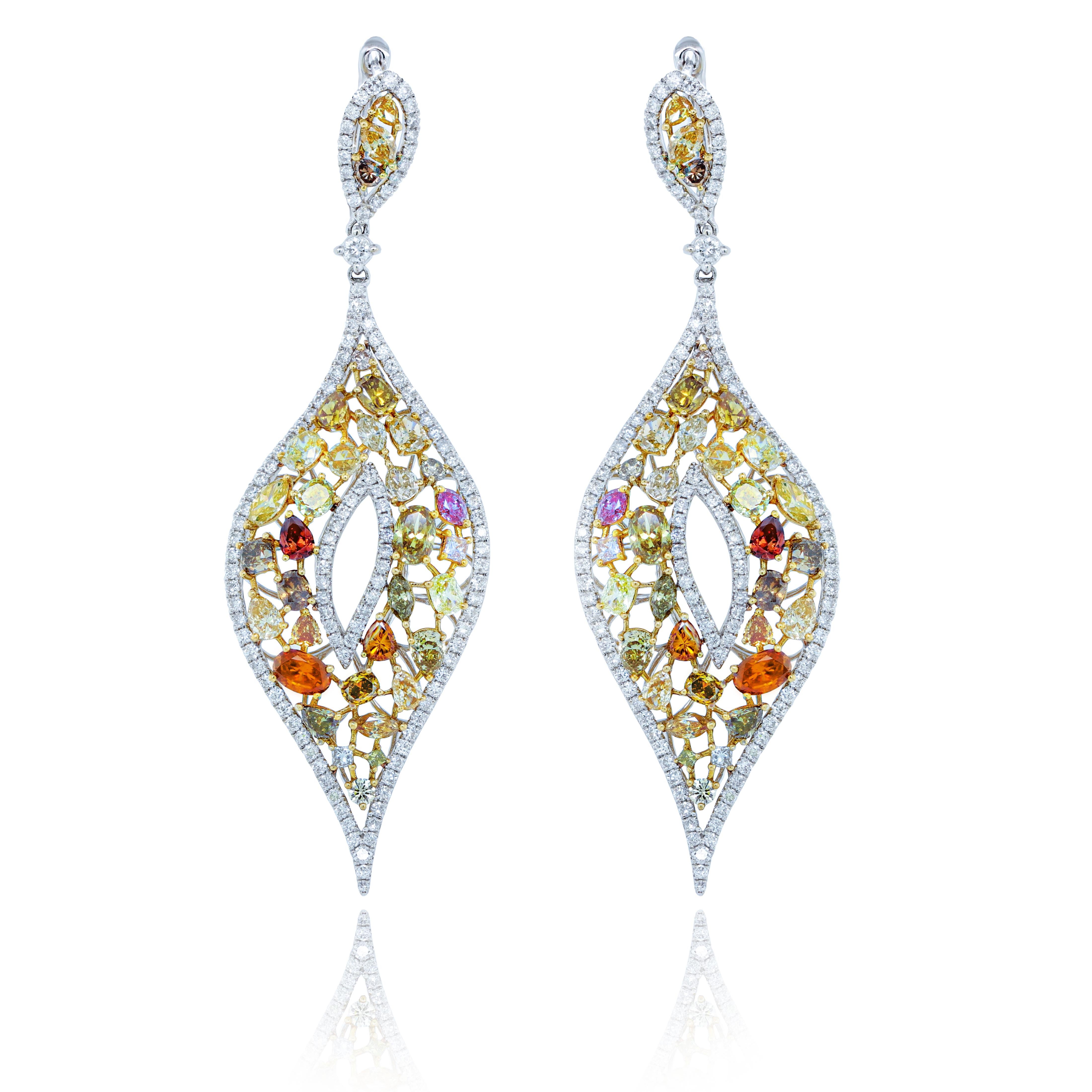 18k white gold diamond earrings features 11.50 carat of diamonds
