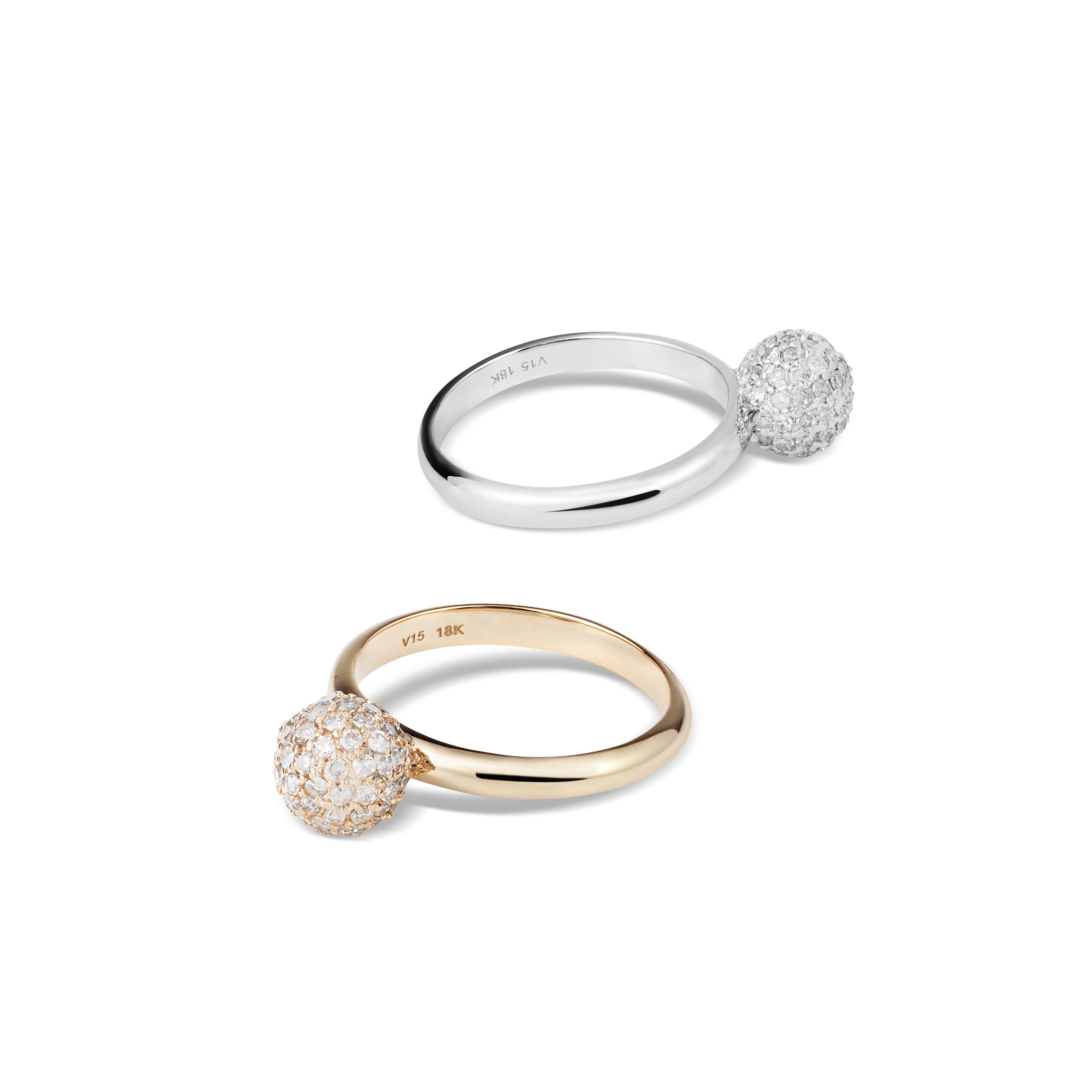 A new take on a classic, THEVAULT15's massive 18-karat white gold encrusted sparkling diamond-encrusted ring is inspired by the flawless silhouette of an orb. Beautifully handcrafted by our artisans, perfect for stacking with any combination.       
