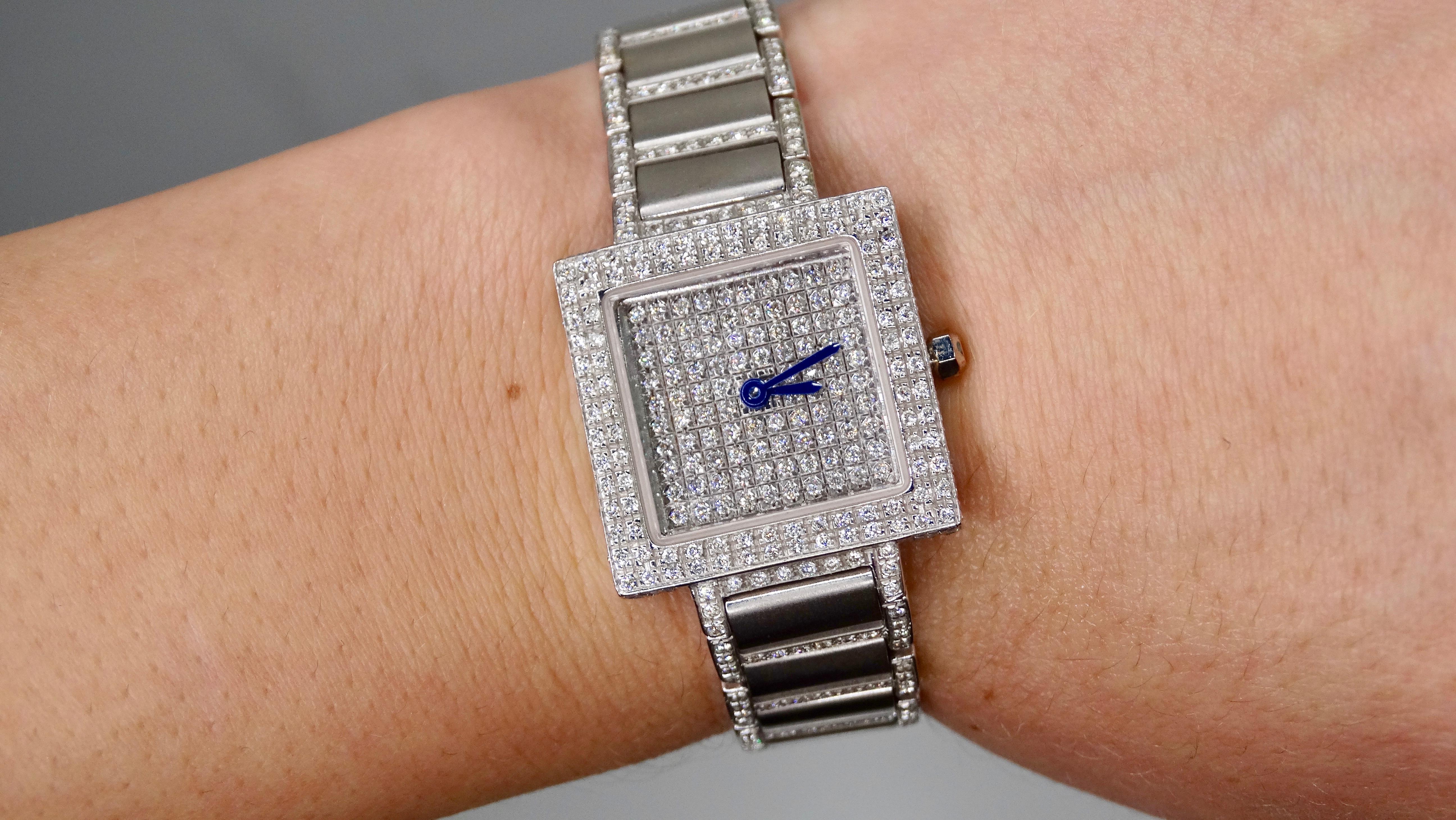 Take sparkle to a new level with this stunning diamond watch! Circa late-20th century, this custom made watch is crafted from 18k White Gold with a link bracelet. Encrusted with over 150 brilliant round cut VS Diamonds, this watch features a square