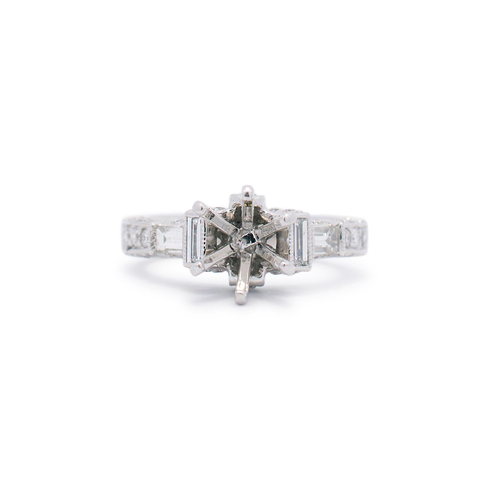 Gender: Ladies

Metal Type: 18K white gold

Size(US): 5

Width: 6.70mm

Total Weight: 6.10 grams

18K white gold diamond semi-mount engagement ring. Was polished and rhodium plated. Has a tapered shank that measures approximately 7.30mm tapering to