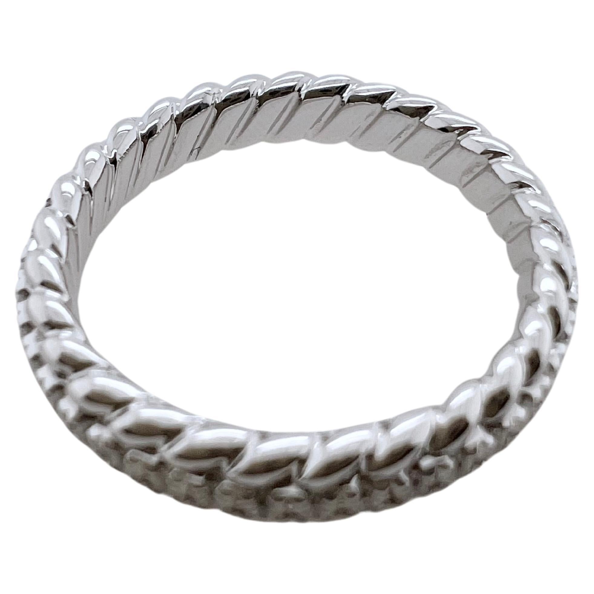 This amazing band will be your go to favorites.  This individual band is made in 18k white gold with round brilliant diamonds prong set.  The outer edges have a unique rope style trim that give texture and character.  The solid gold is made sturdy