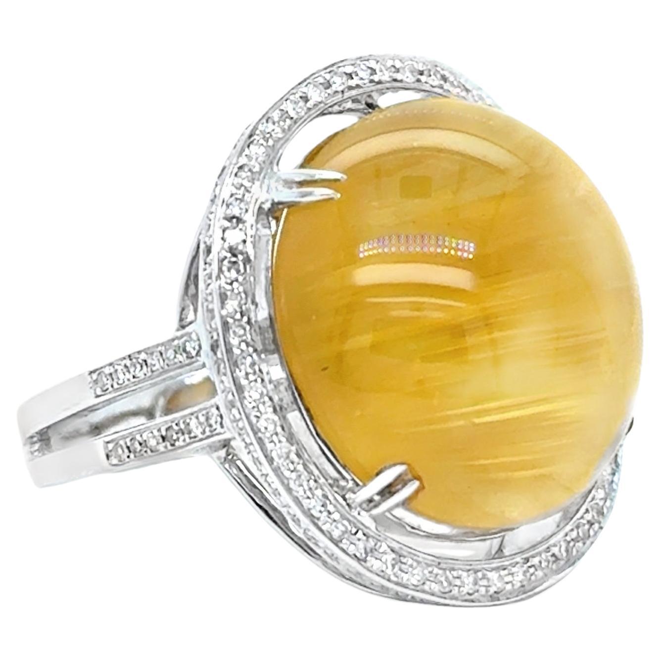 18K White Gold Diamond Halo and Cat's Eye Chrysoberyl Ring