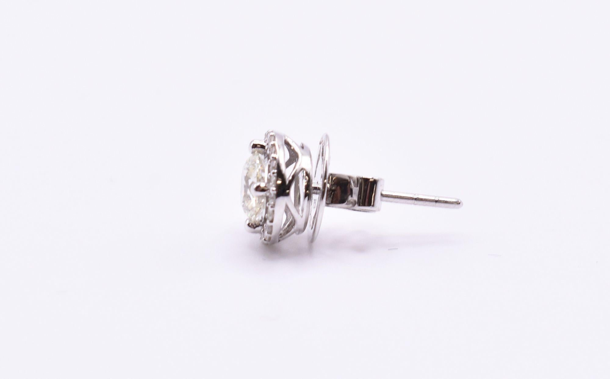 Contemporary 18k White Gold Diamond Halo Stud Earrings For Sale