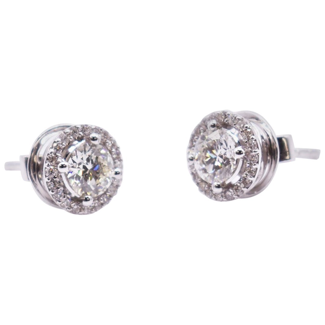 Pendientes de oro blanco de 18 quilates con halo de diamantes