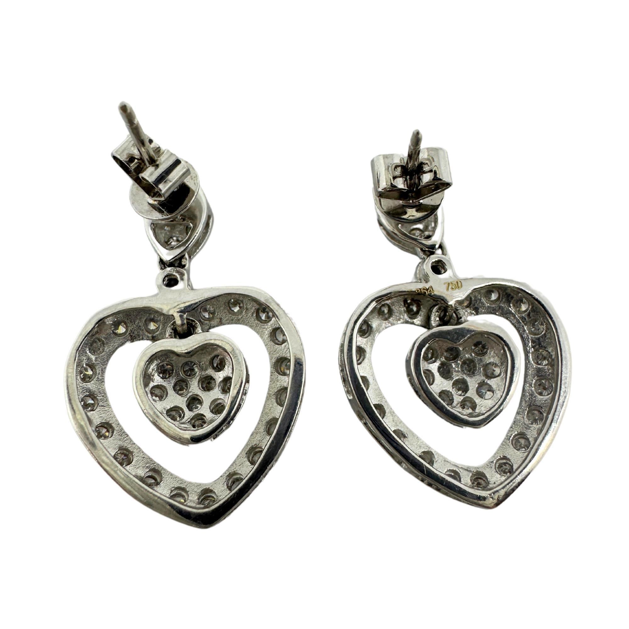 18k White Gold Diamond Heart Drop Earrings
Condition: In good condition with some minor surface wear consistent with age.
Measurments: 1 inch x 0.60 inches
Markings: “750