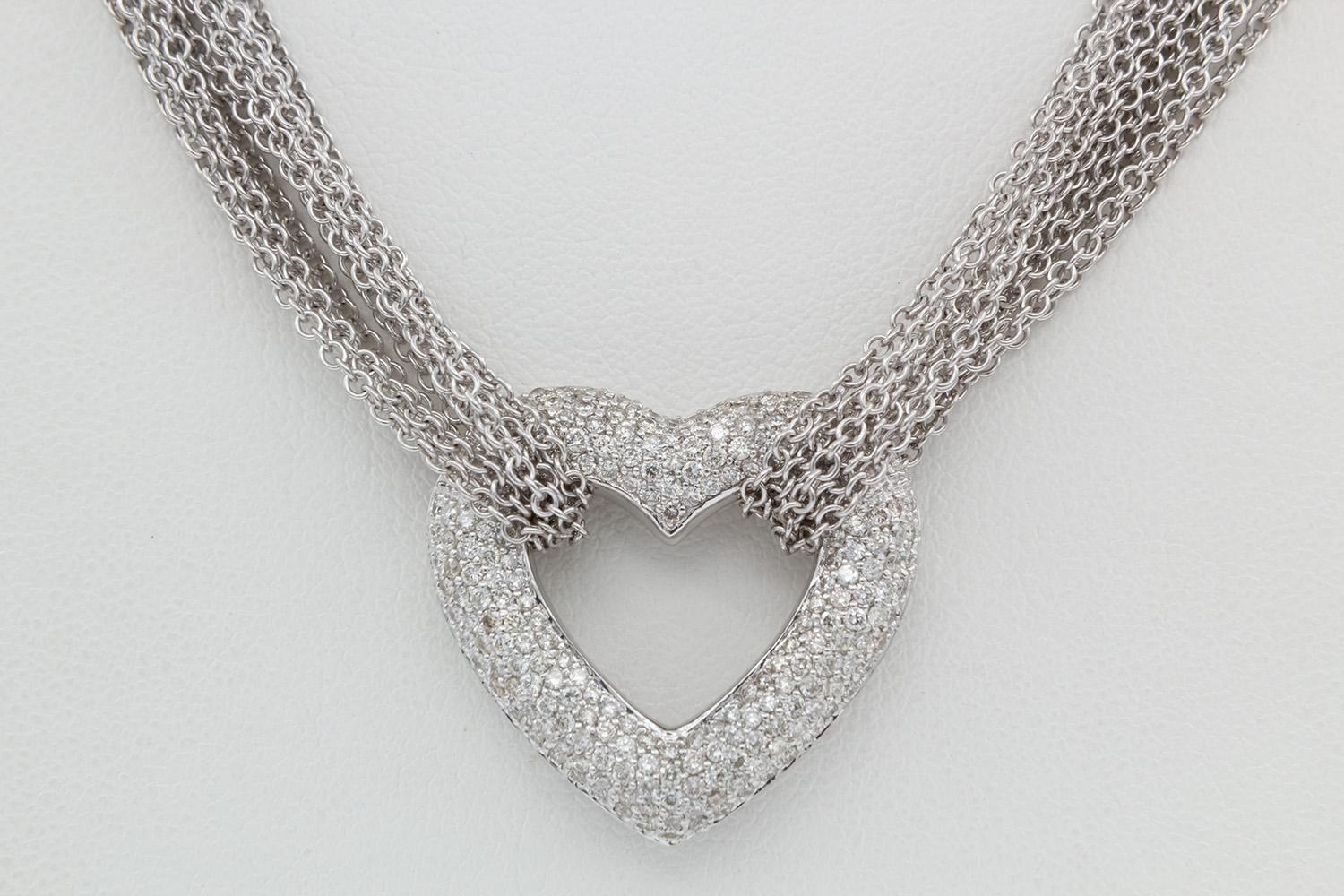 We arepleased to offer this 18k White Gold & Diamond Heart Pendant Necklace. A timeless pendant crafted from dazzling round diamonds, celebrating the exquisite silhouette of your love. This is stunning 18k white gold pendant is set with an estimated