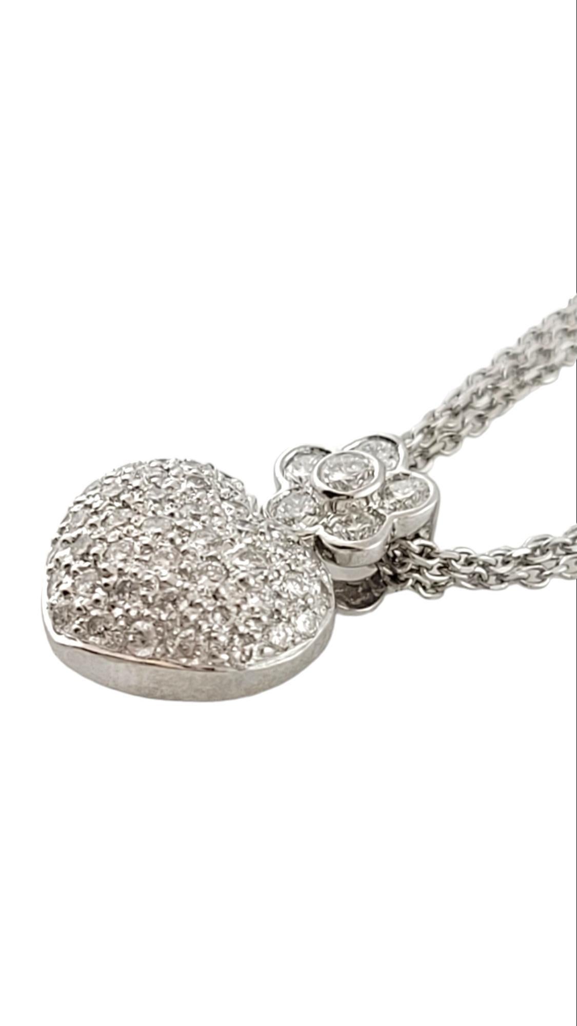 18K White Gold Diamond Heart Pendant w/ 14K White Gold Chain

This beautiful 14K white gold triple chain is paired with a gorgeous 18K gold heart and flower pendant with 51 sparkling round brilliant cut diamonds!

Approximate total diamond weight: