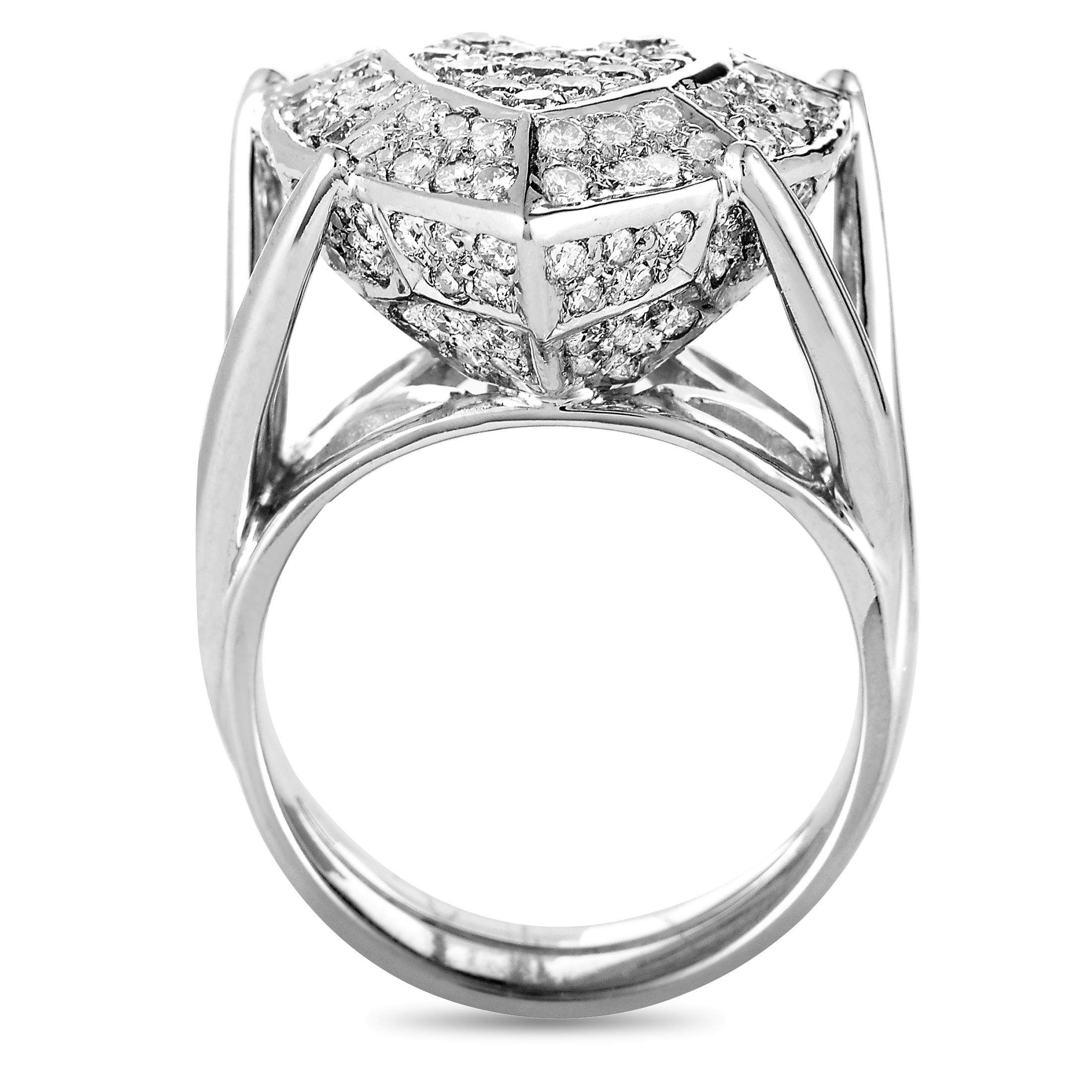 This ring is made out of 18K white gold and diamonds that amount to 1.87 carats. The ring weighs 16.4 grams, boasting band thickness of 6 mm and top height of 10 mm, while top dimensions measure 18 by 20 mm.

Offered in estate condition, this