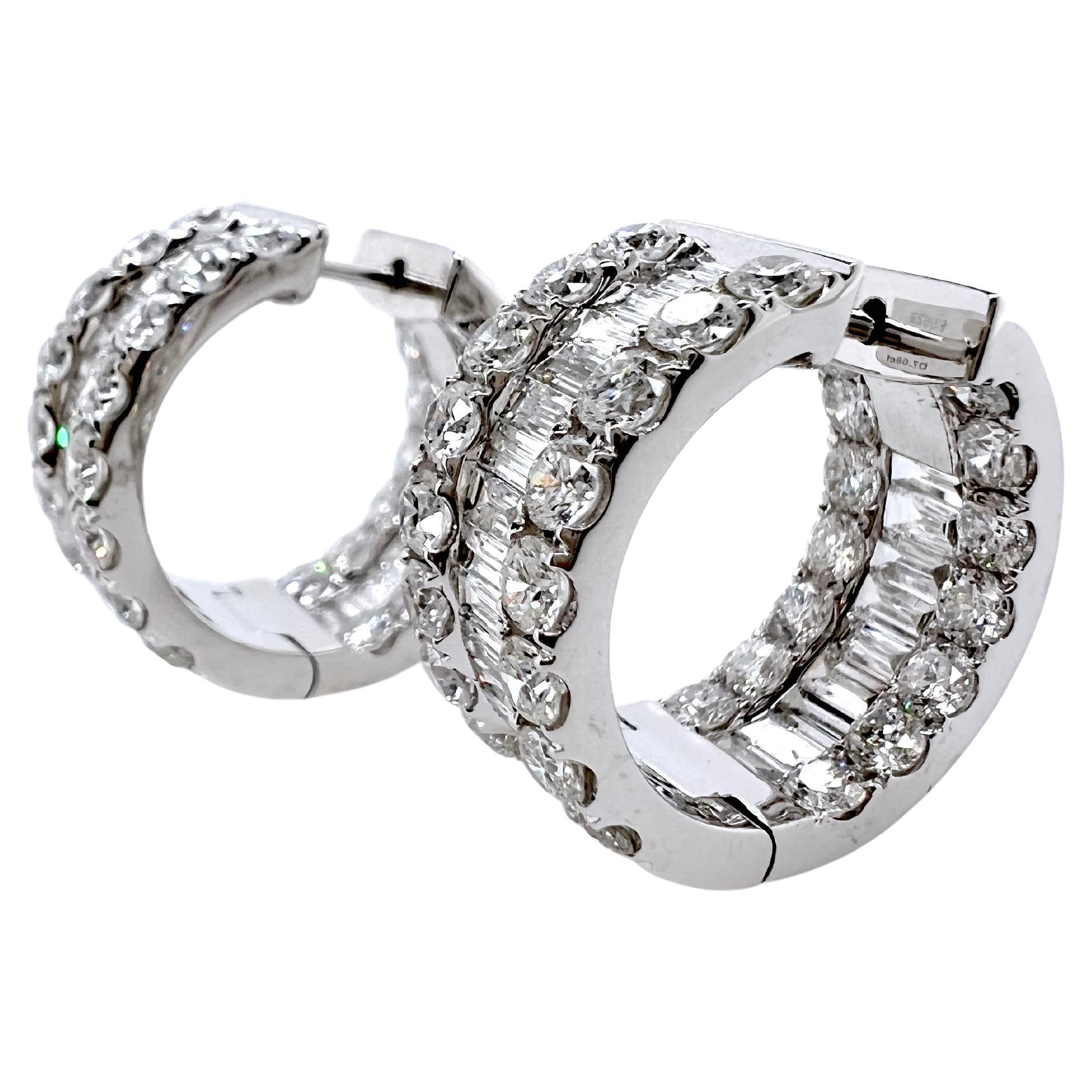 This amazing 18k white gold hoop earrings have large baguette and round diamonds set on the outside and inside part of the hoop.  These are not your typical hoop earrings. These are perfect for smart casual or formal look that will make you stand