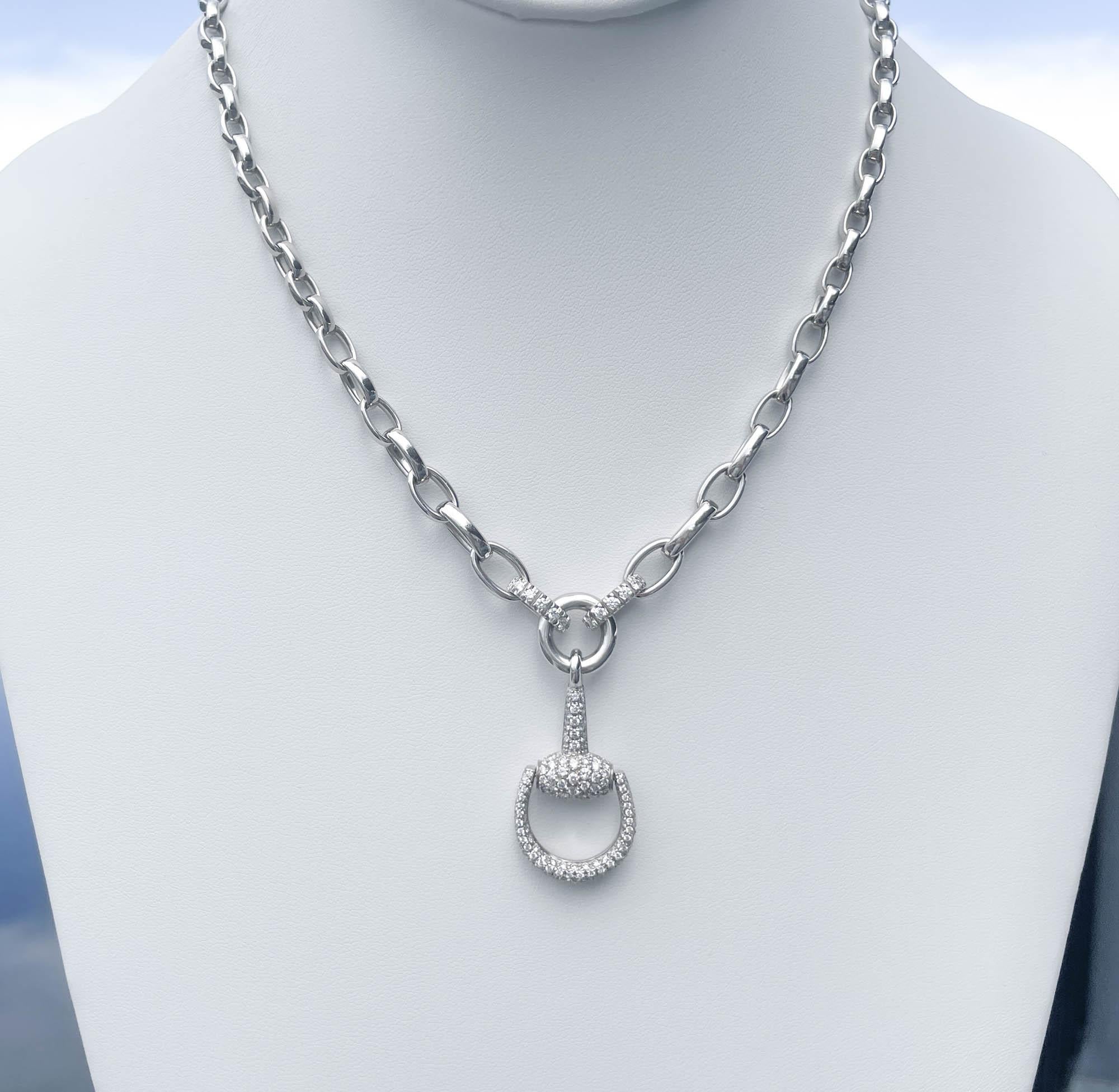 18k White Gold Diamond Horsebit Necklace with pave set small round brilliant diamonds; estimated total weight is approx. 2.04ct (F-G, VS overall). The necklace is 17.75 inches; the horsebit pendant is 2 inches long. Total weight of the necklace is