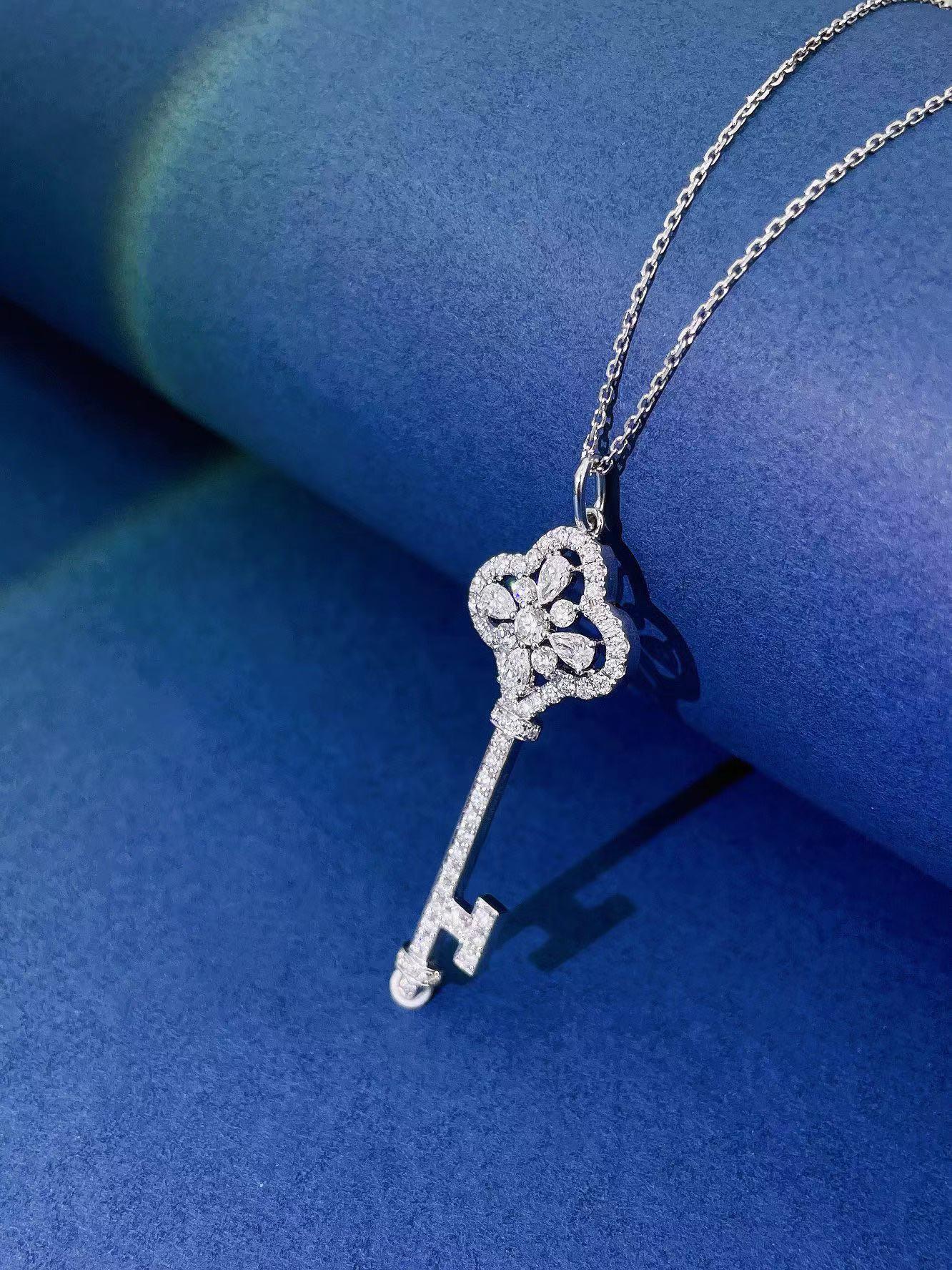 Modern 18K White Gold Diamond Key Necklace For Sale