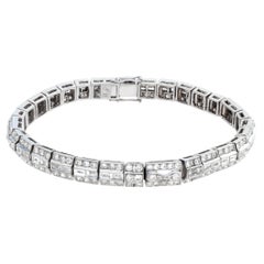 18k white gold diamond line bracele with 4.55 carats in round and emerald cut di
