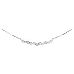 Collana a barrette medie a cascata in oro bianco 18k e diamanti