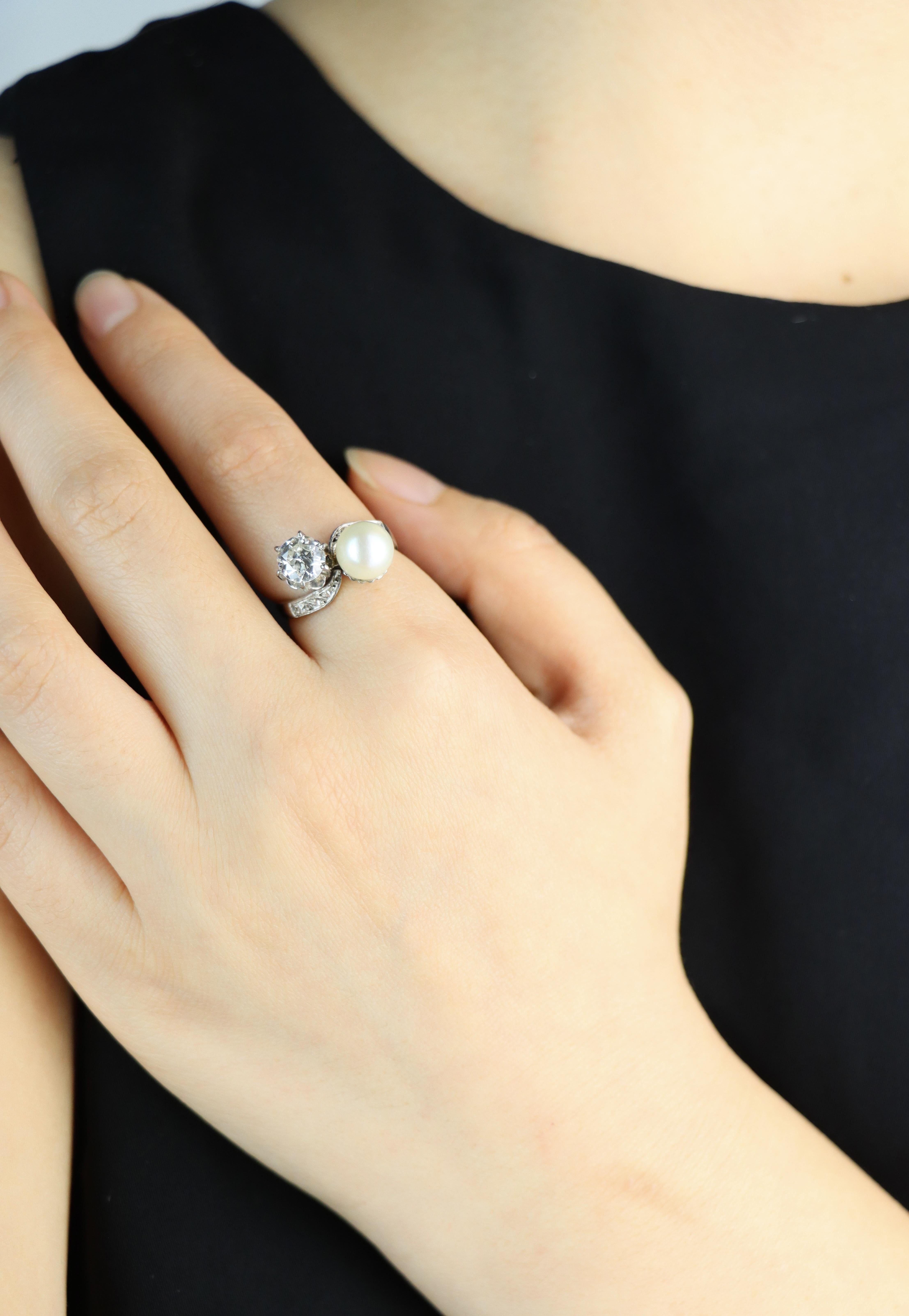 18K White Gold Diamond Pearl Toi Et Moi Ring

Approximate Dimensions:
6 (Ring Size) 
7.55 mm (Pearl)
0.80 carat (Diamond)
4.3 grams in weight.