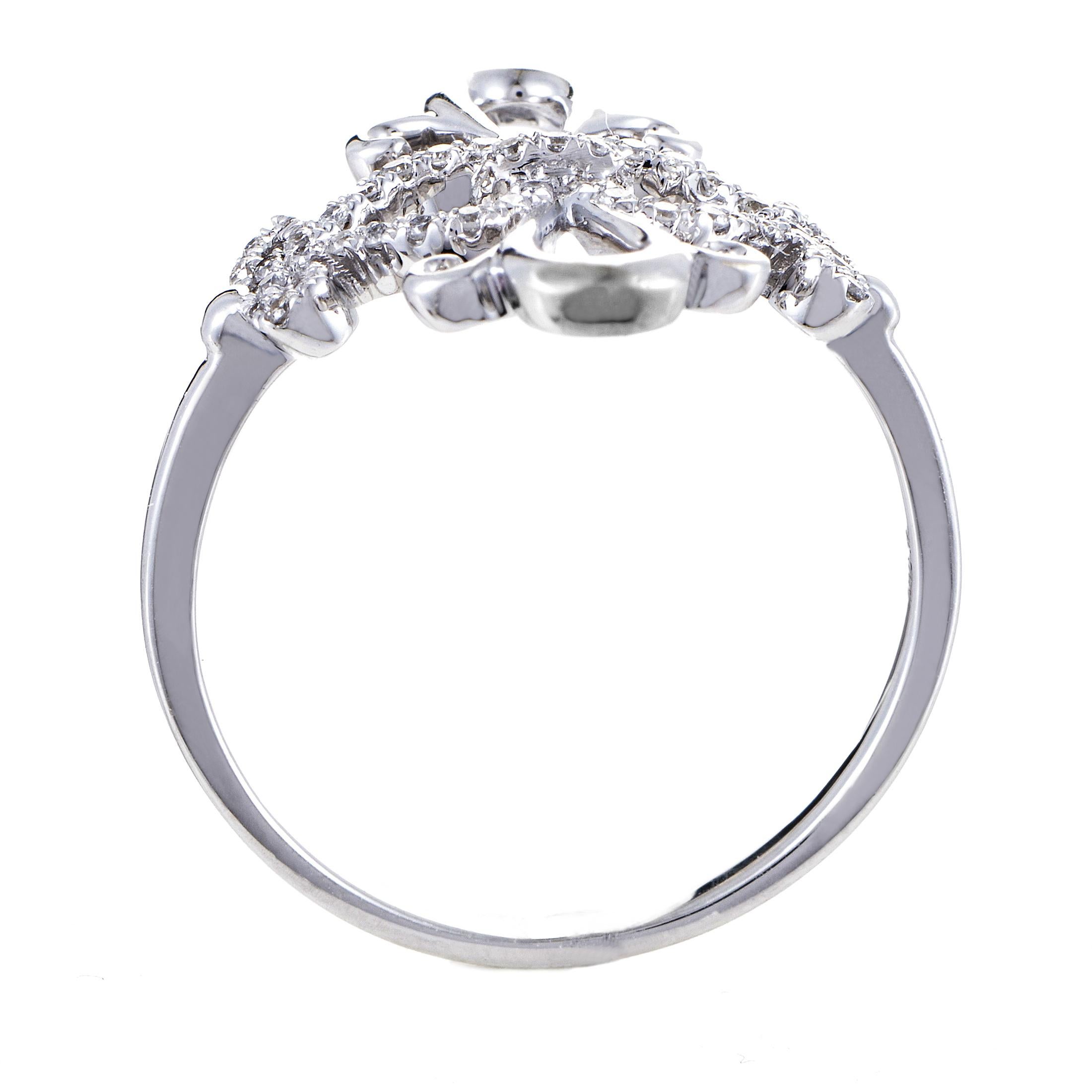Delightful and irresistibly graceful décor combines the smooth flow and immaculate gleam of 18K white gold with prestigious resplendence of diamonds totaling 0.24ct in this fascinating and wonderfully harmonious ring.<br />Ring Top Dimensions: 17 x