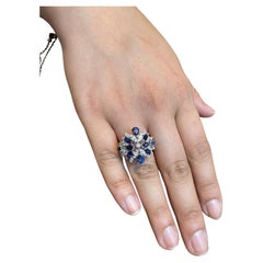 18K White Gold Floral Ring with 0.71ct Diamonds & Blue Sapphires, UAE