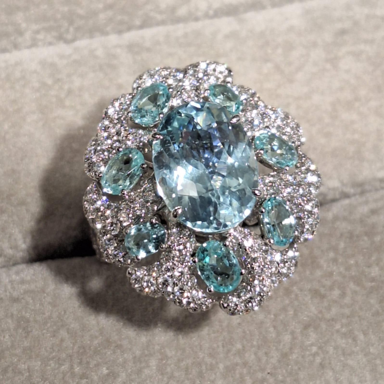 18K White Gold Diamond Ring with Paraiba

Paraiba Tourmaline makes an effective healing stone that brings hope, joy and luck. Provides greater mental clarity and tranquility.

Diamonds symbolise clarity and purity, also represent innocence,
