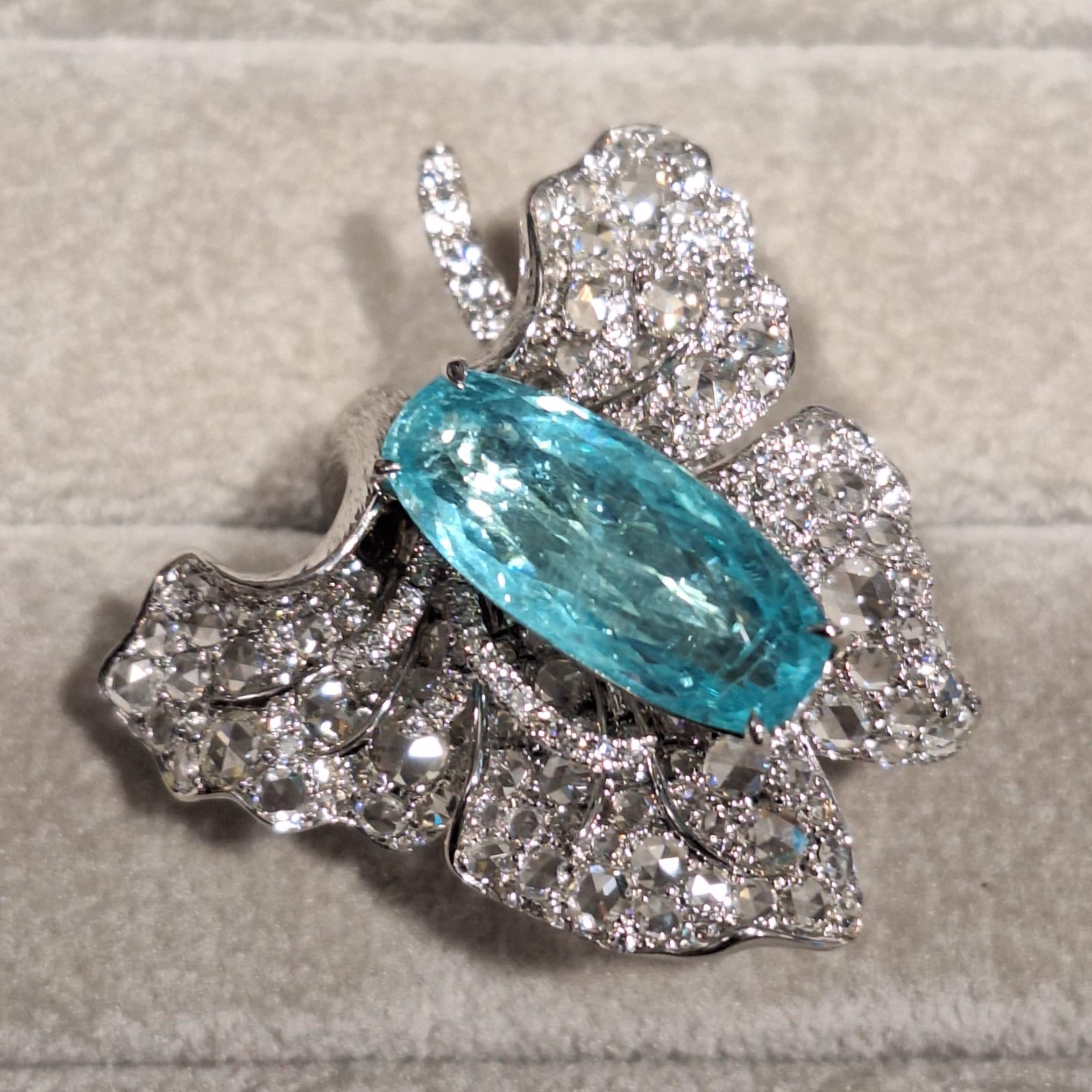 18K White Gold Diamond Ring with Paraiba

Paraiba Tourmaline makes an effective healing stone that brings hope, joy and luck. Provides greater mental clarity and tranquility.

Diamonds symbolise clarity and purity, also represent innocence,