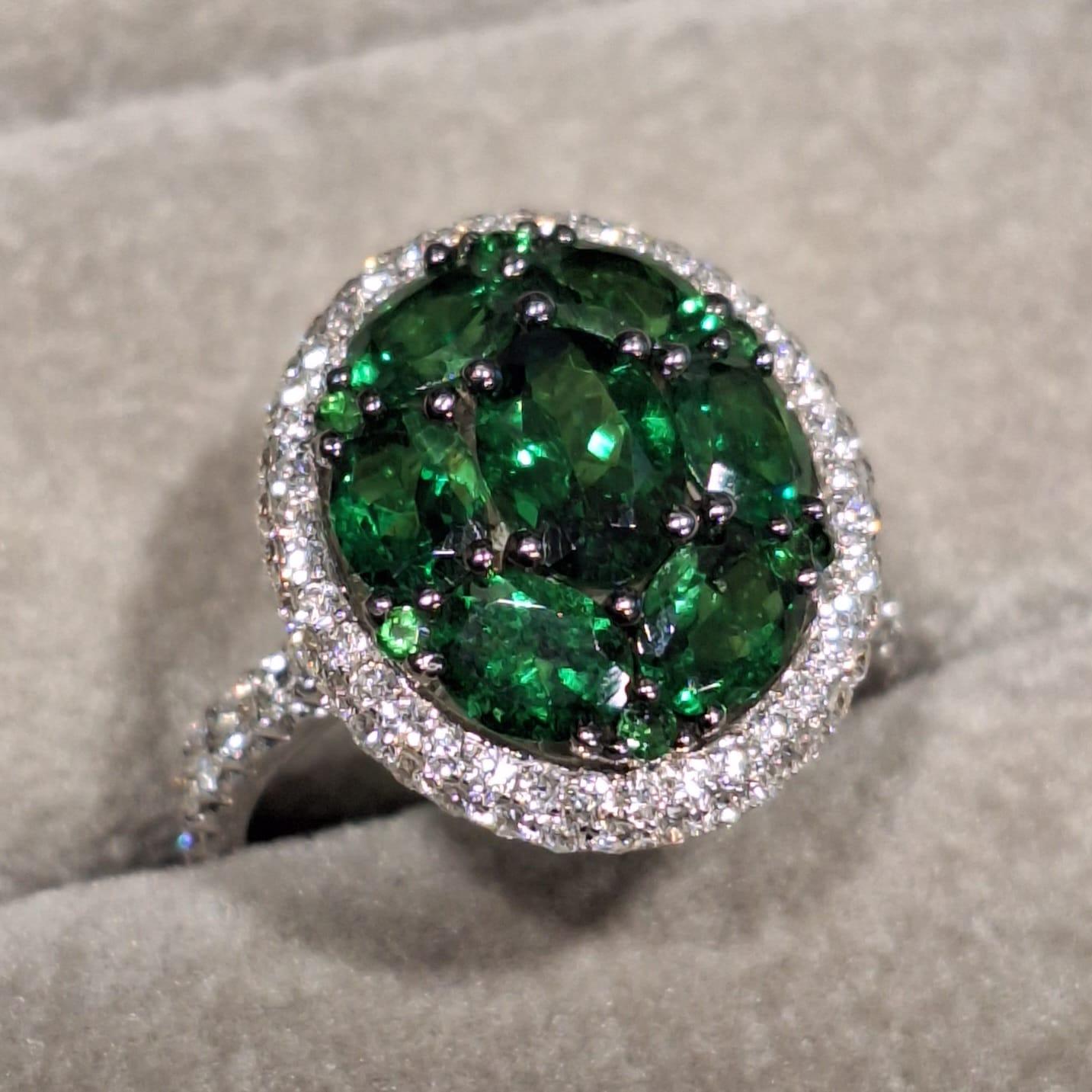 18K White Gold Diamond Ring with Tsavorite

Tsavorite of benevolence, vitality, prosperity, vigor and compassion. It is believed to be the gemstone that helps one discover the beauty within themselves and others.

Diamonds symbolise clarity and