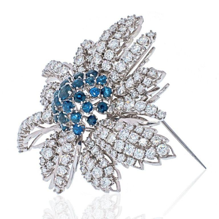It is so hard to come by a beautiful sapphire and dimaond brooch that has just enought diaonds and just enough of diamonds. And when finding one you rarely see a brooch that as pretty as this one. It is perfect in size and in quality and can be worn