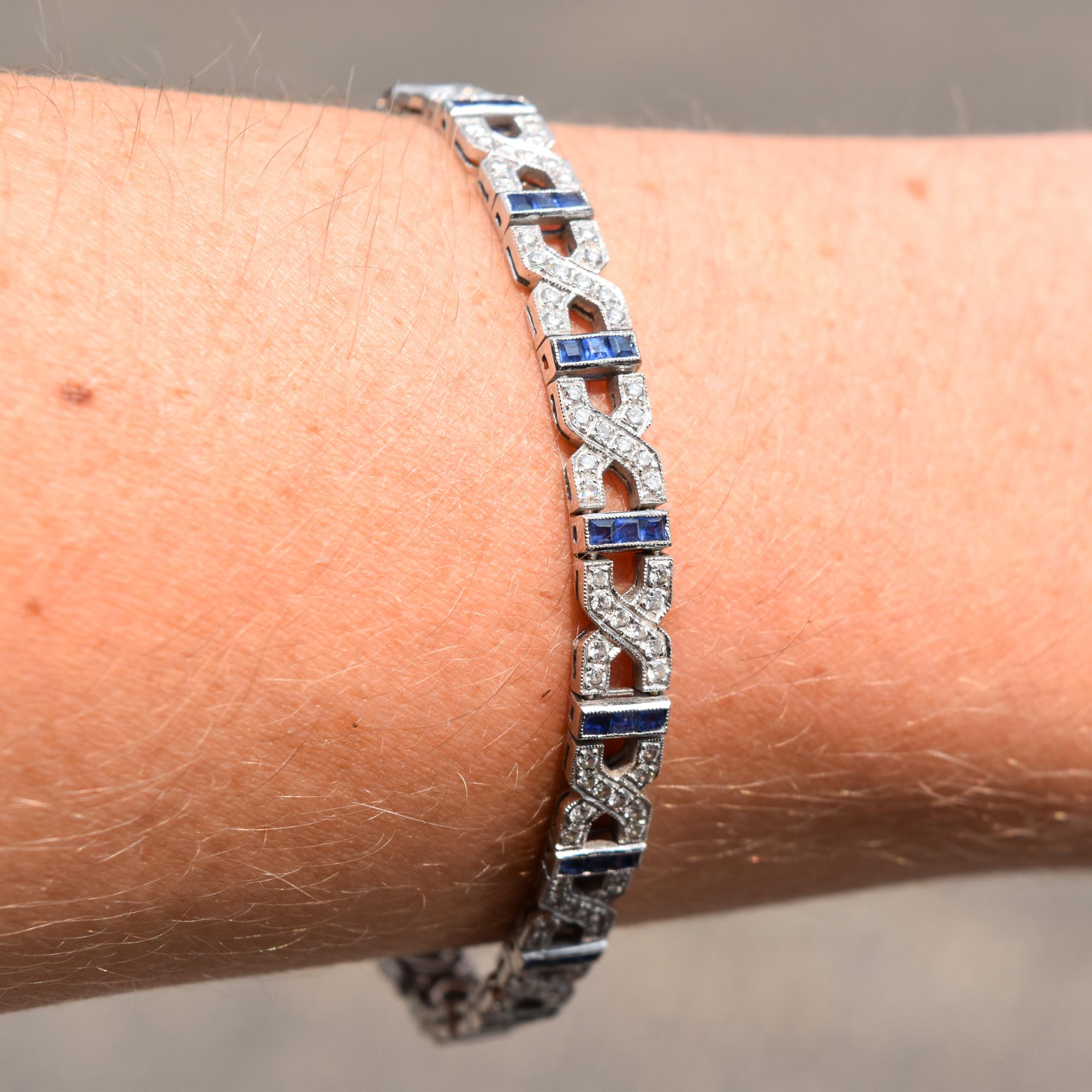 Women's 18K White Gold Diamond Sapphire Infinity Link Bracelet For Sale