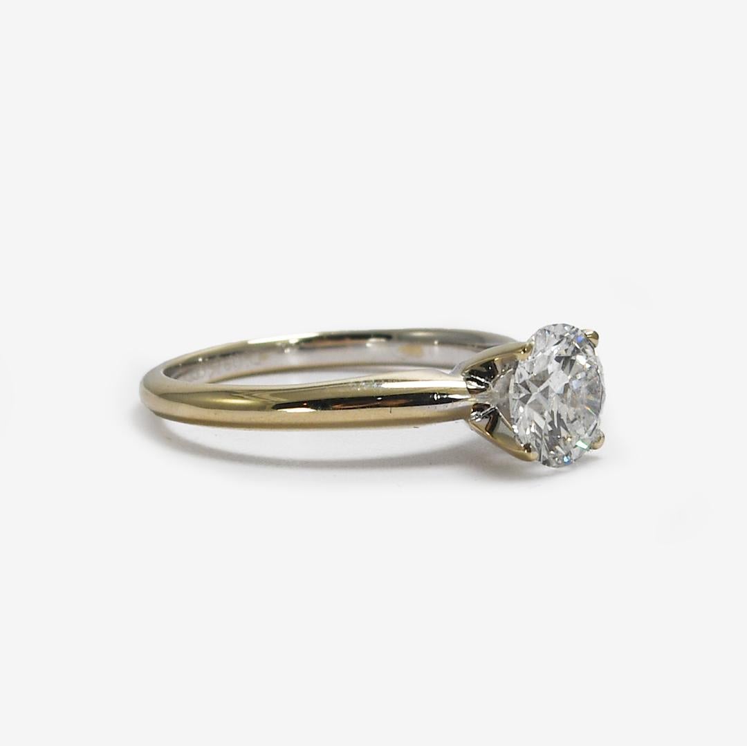 18k white gold diamond solitaire engagement ring.
Stamped 18k and weighs 2.7 grams.
The ring tests 74% gold with an XRF metals analyzer.
The diamond is a round brilliant cut, weighing 1.00 carats.
The color is F to G color and clarity is i1 to
