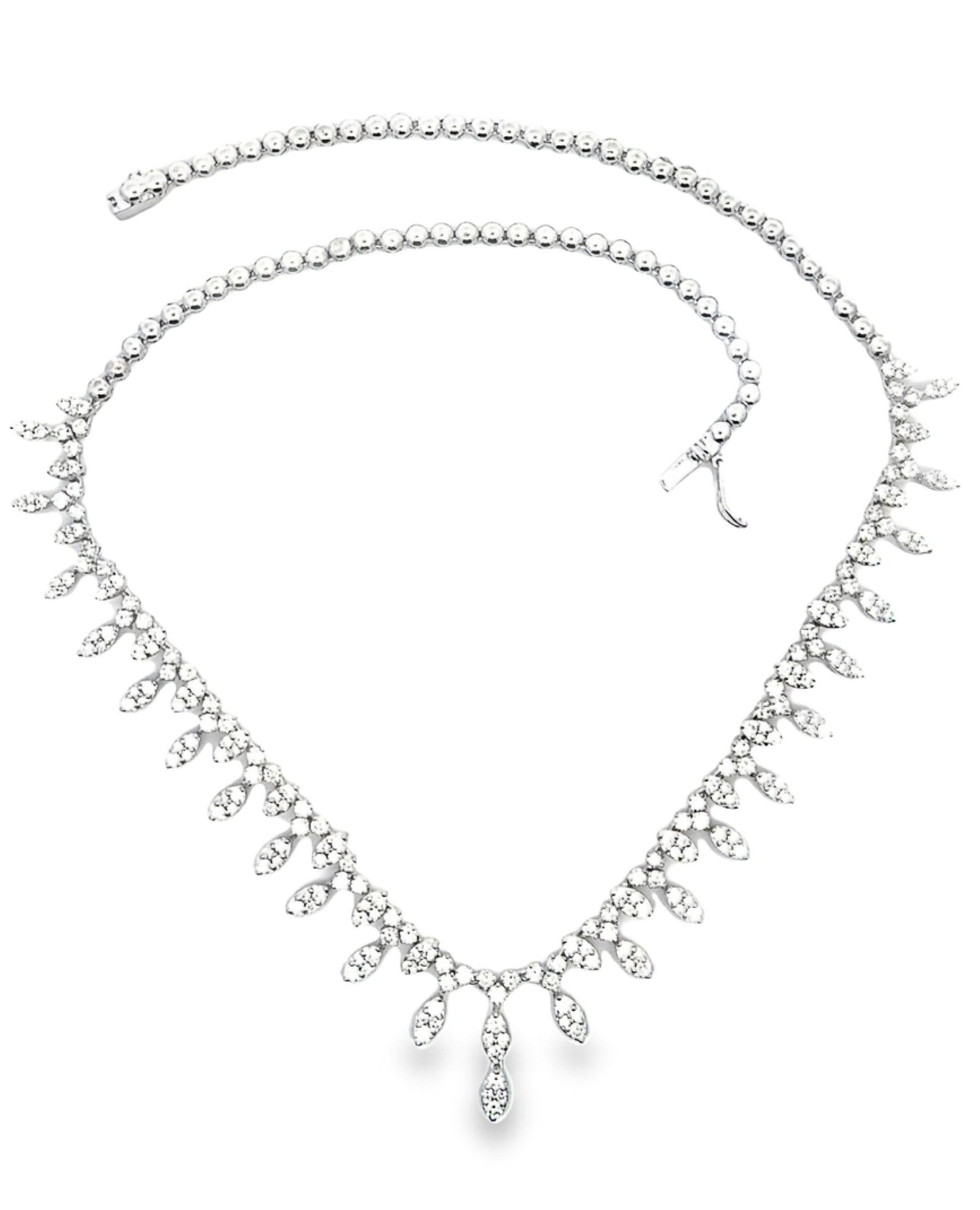 18K white gold diamond statement necklace with 253 round brilliant-cut diamonds weighing 3.65 carats total.

- 16 inches long.
- Diamonds are H color, VS2/SI1 clarity.