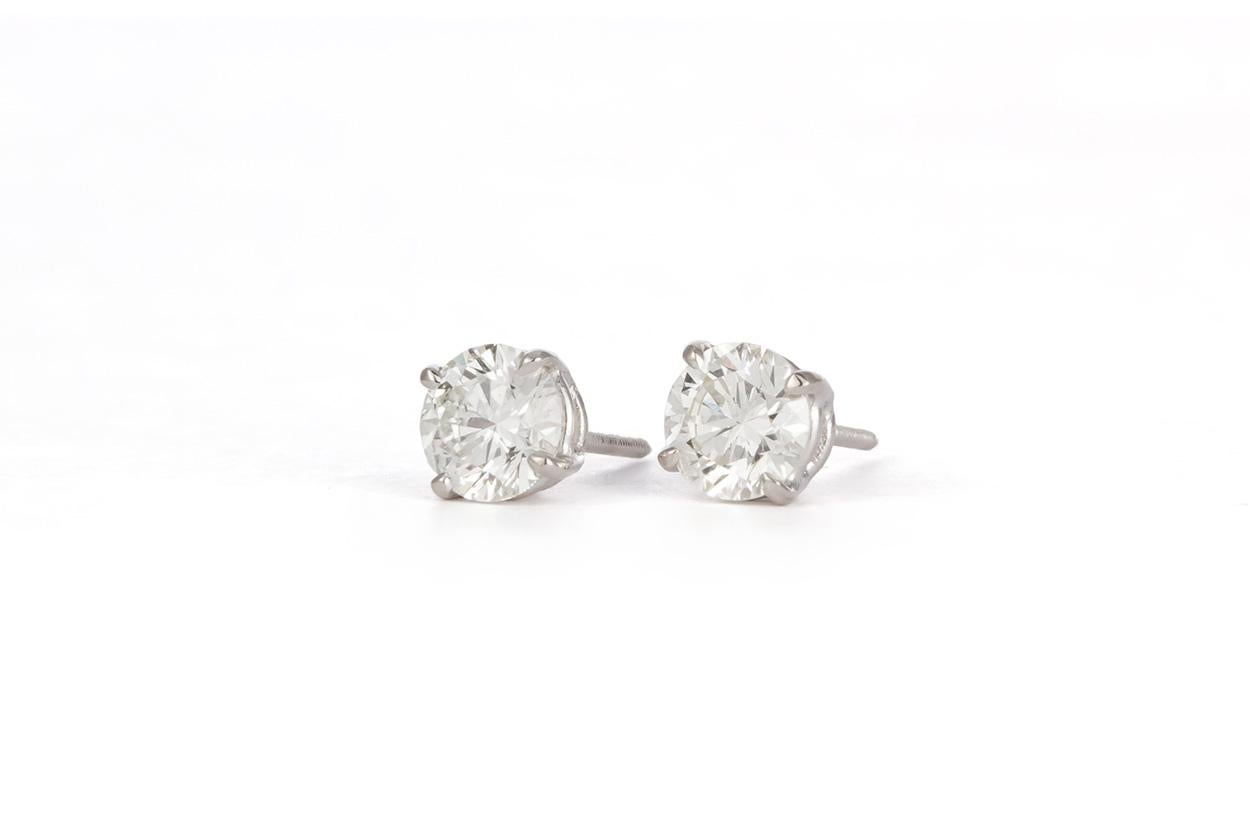 We are pleased to present these 18K White Gold & Diamond Stud Earrings. These beautiful earrings feature 1.02ctw H-I/SI1-SI2 Round Brilliant Cut Diamonds set in 18k White Gold with screw back setting. The earrings are brand new unworn. They were