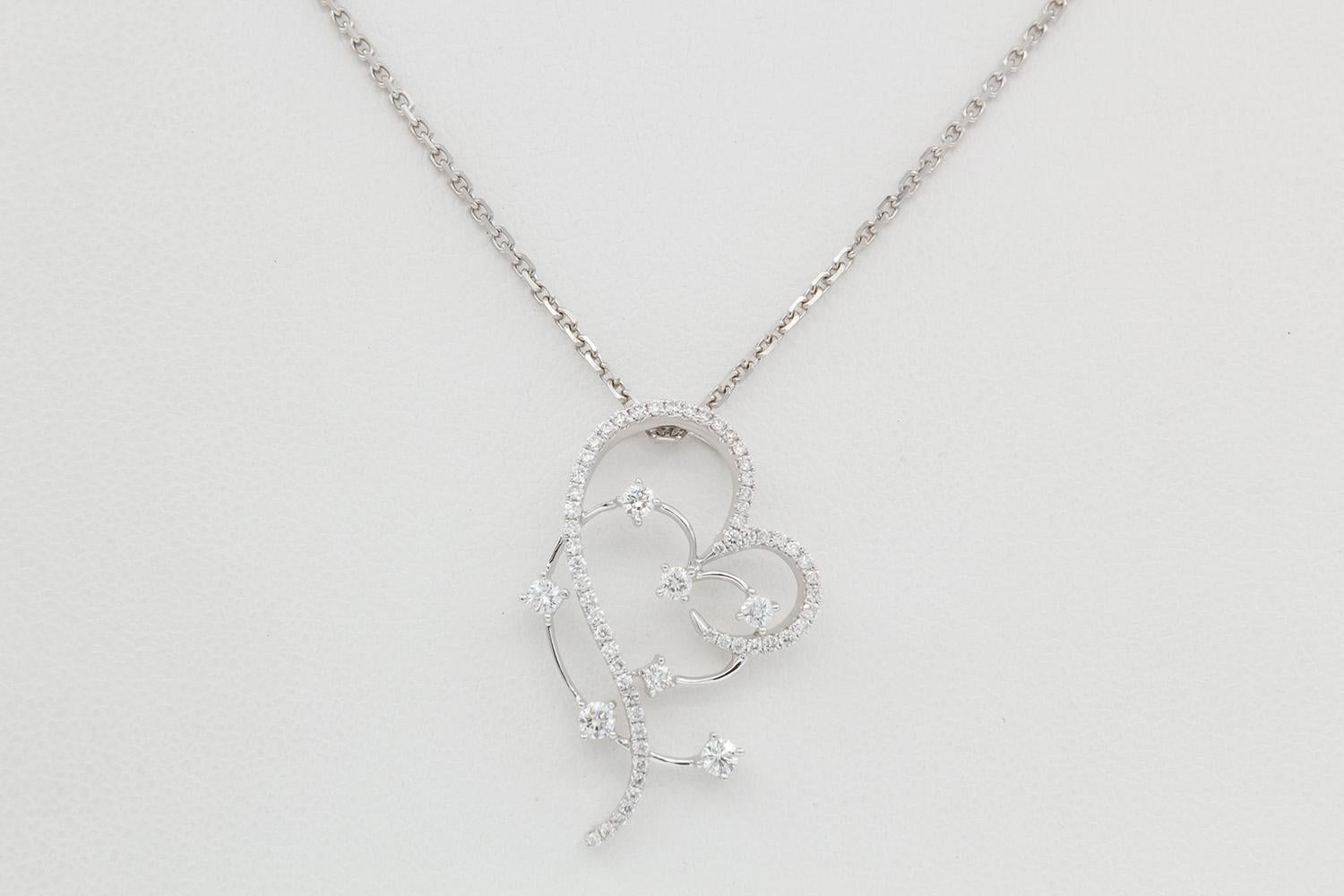 Round Cut 18k White Gold & Diamond Sweeping Heart Silhouette Pendant Necklace For Sale