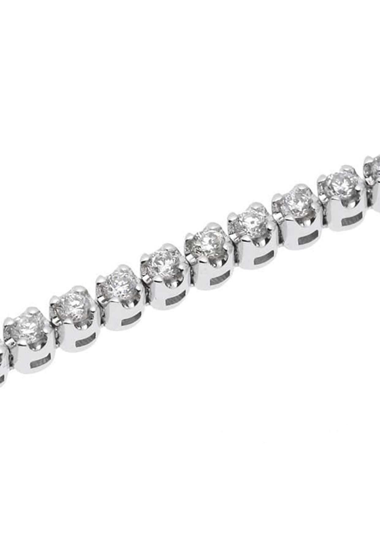 Ajoutez une élégance intemporelle à votre poignet avec cet exquis bracelet de tennis en or blanc 18 carats orné de diamants étincelants d'une valeur totale de 0,82 ct.

Détails :

* SKU : cin400
* Matière : Or blanc 18K
* Type de bijoux : Bracelet
*