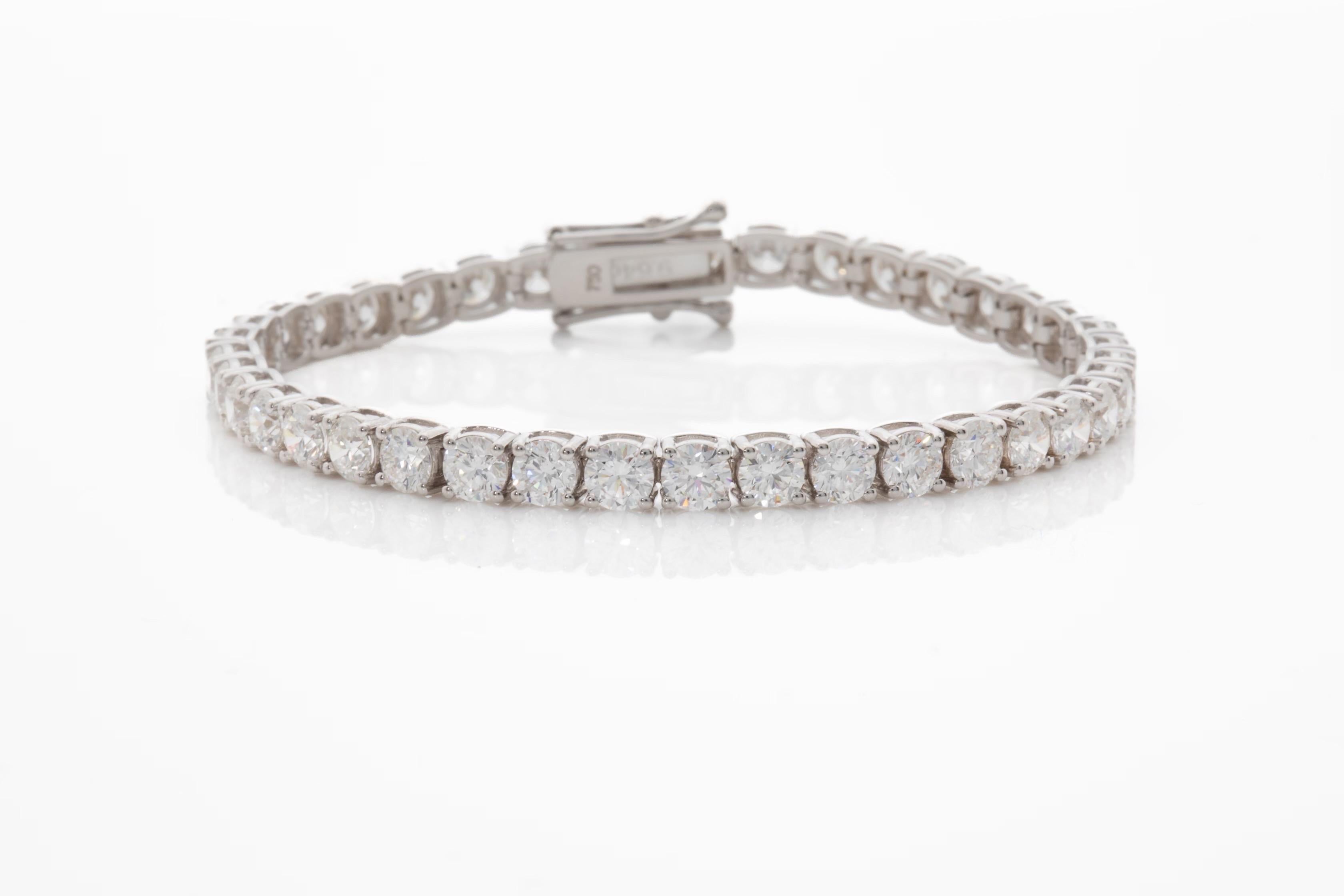 Handmade 18K White Gold Tennis Bracelet with 39 Round Brilliant cut diamonds D color VVS clarity DTW. 9.64ct, 6.5 inch, 12.41grams.

Viewings available in our NYC wholesale office by appointment only. 

Accredited appraisal from independent
