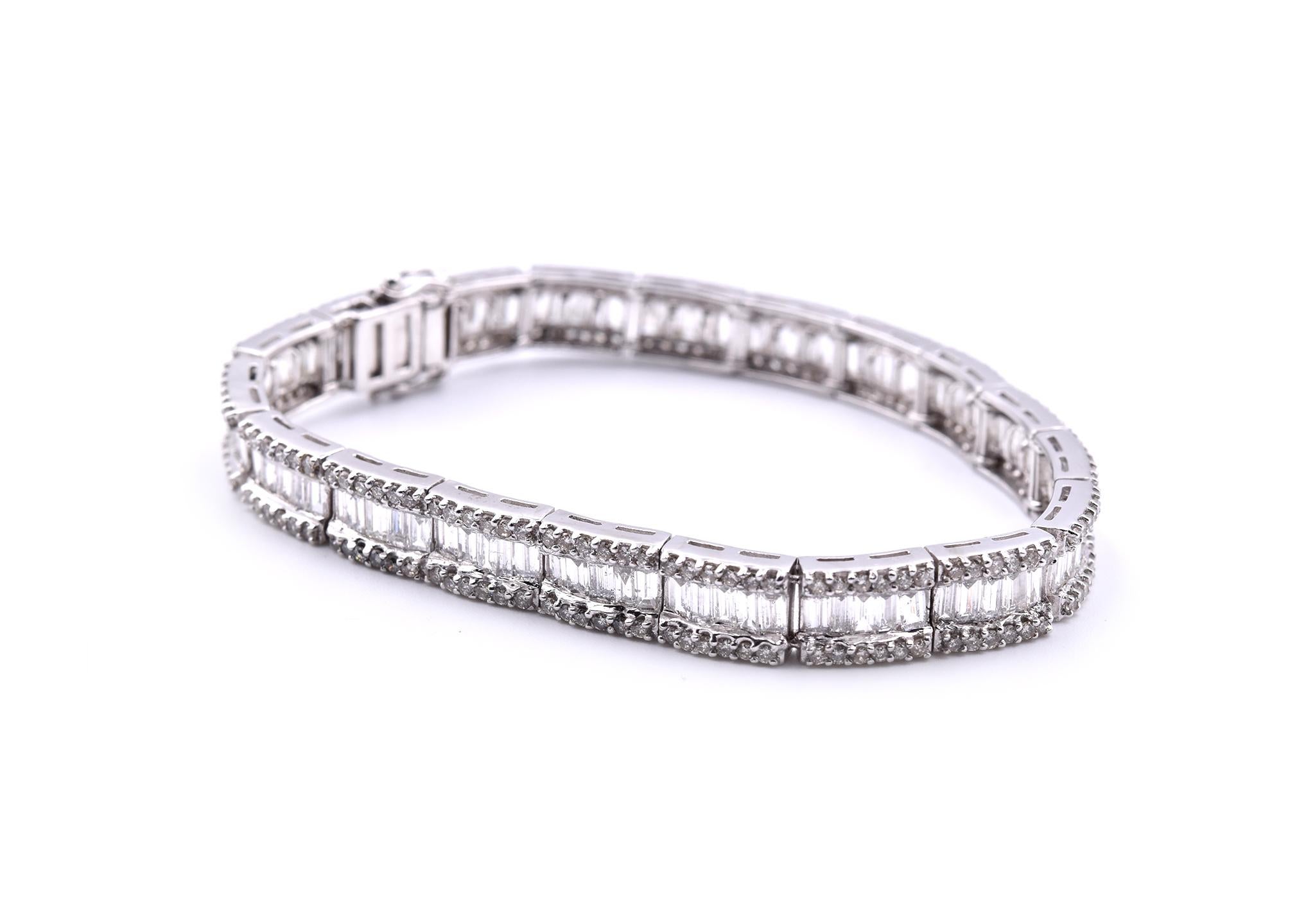 Designer: signed BJC 
Material: 18k white gold
Diamonds: 95 baguette cut= 2.28cttw
Color: G
Clarity: VS
Diamonds: 228 round brilliant cut= 2.85cttw
Color: G
Clarity: VS
Dimensions: bracelet will fit a 6 ¼-inch wrist and it is 7.19mm wide
Weight: