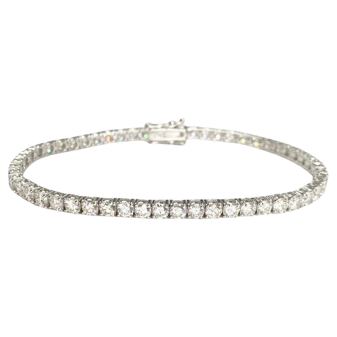 Bracciale tennis con diamanti in oro bianco 18k con un peso di 6,75ctw