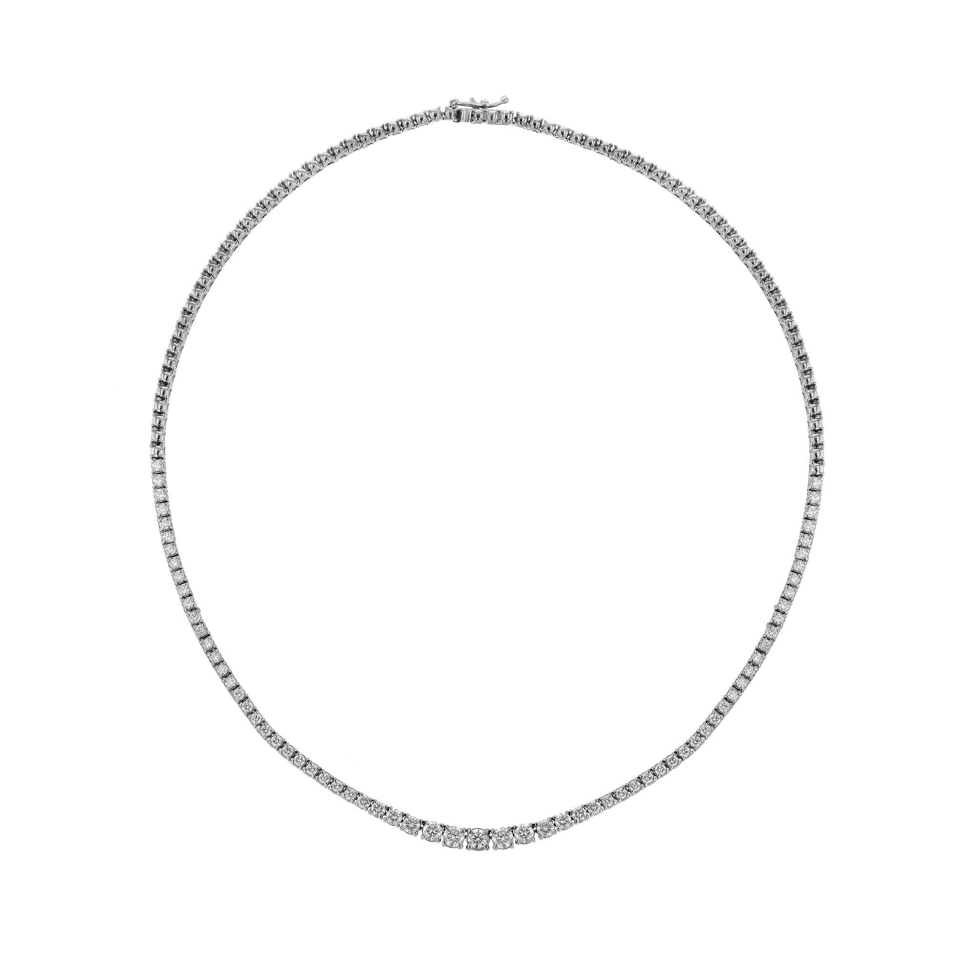 This paperclip necklace is made in 18K white gold. It features 81 round cut diamonds weighing 6.77 carats combined. Necklace has a color grade (G) and (H) and clarity grade (SI1) and (VS). The necklace has diamonds all around with white gold