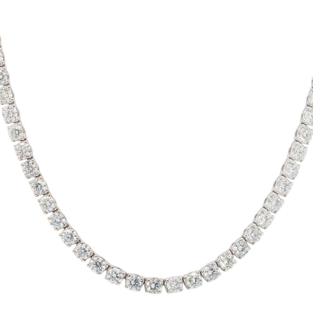This extraordinary custom tennis necklace showcases the ultimate in elegance and sophistication. Crafted in lustrous 18k white gold, the necklace features 78 dazzling round diamonds, totaling an impressive 24.20 carats. Each diamond is approximately