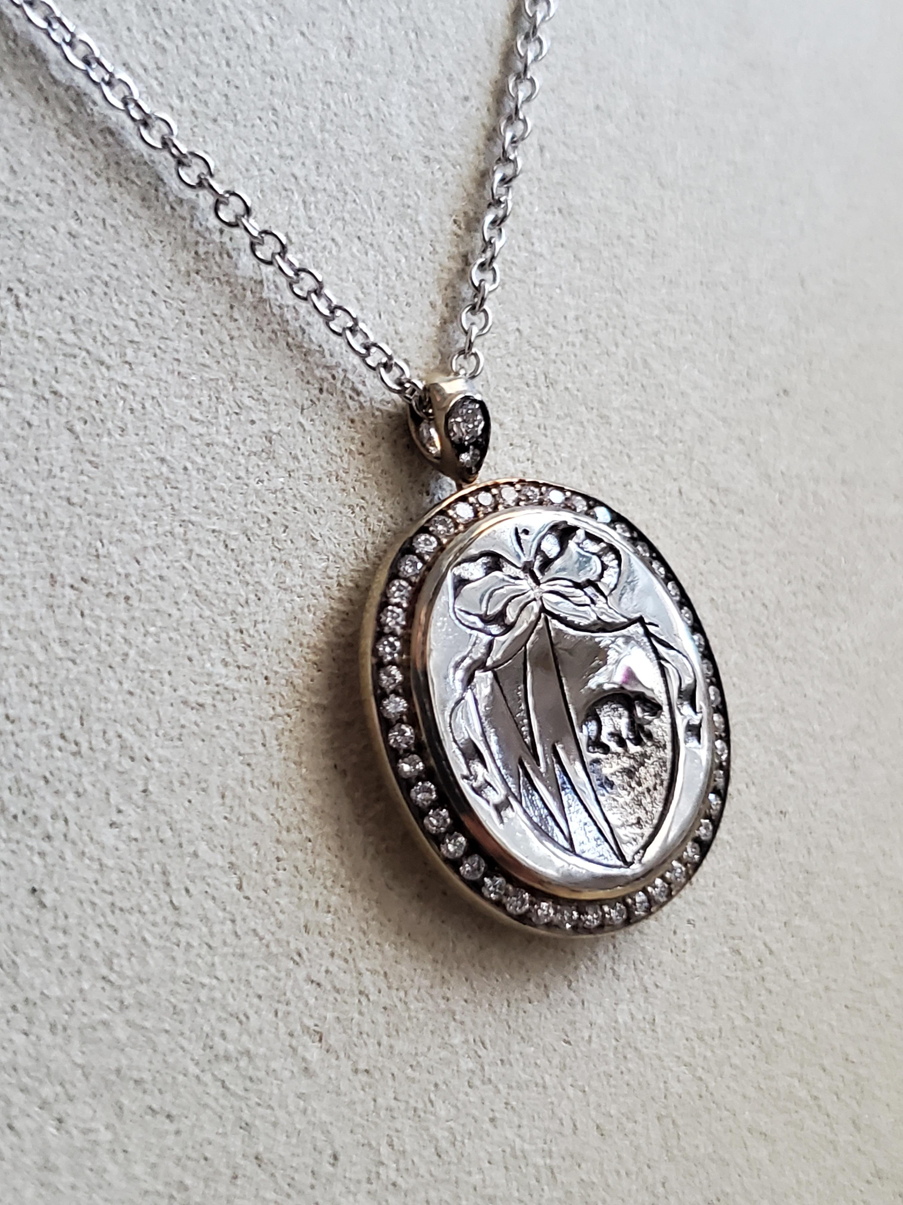 Our 18k white gold and diamond (.30cttw) pendant is hand cast from an antique circa 1700's Georgian-era intaglio seal. A majestic and very special coat of arms featuring a Bear (quite rare in heraldic seals), along with gorgeous chevrons that remind