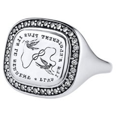 Anello con sigillo in oro bianco 18 carati, diamanti e calcografia