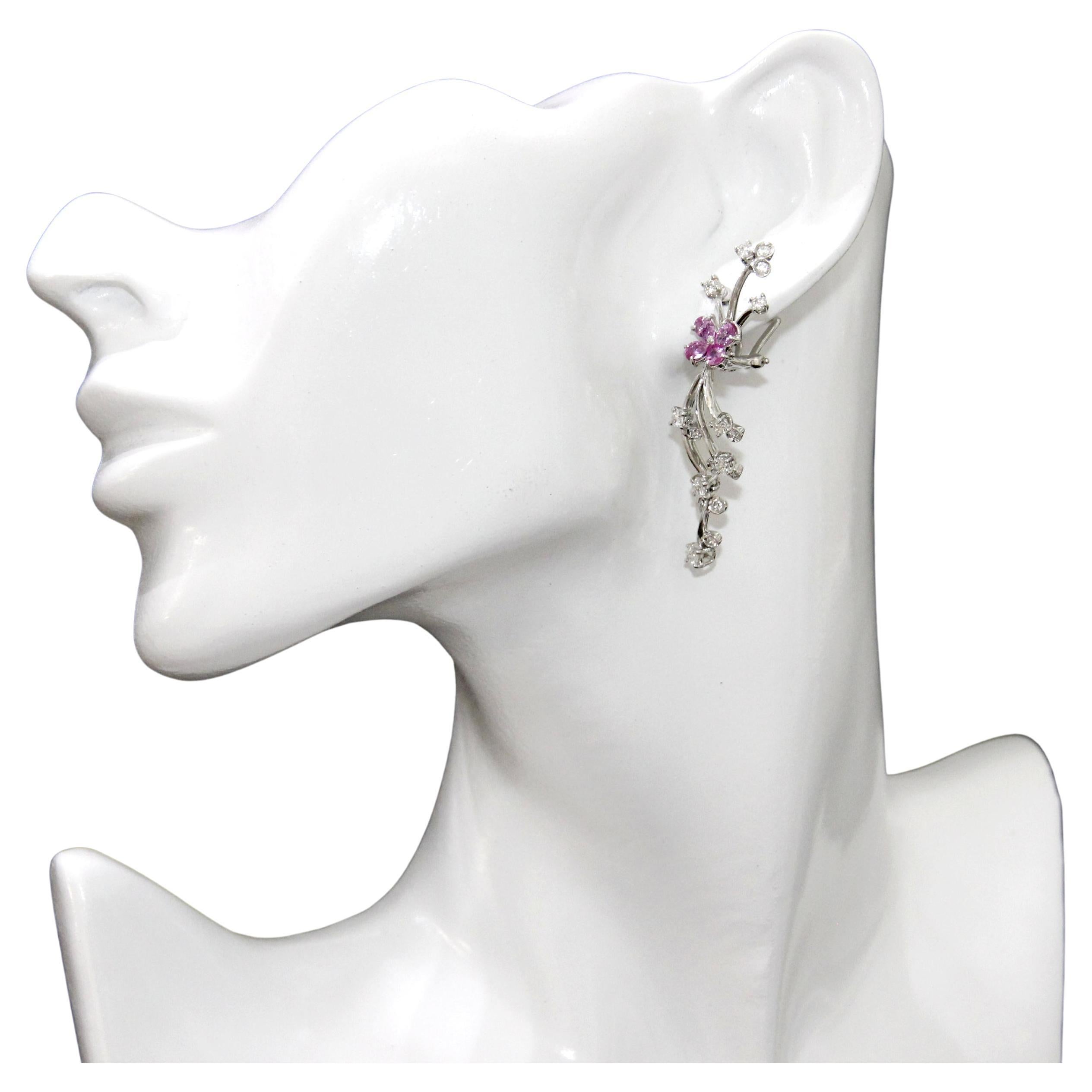 18K White Gold, Diamonds and Pink Sapphire Flower  Earrings
Diamonds .47ctw
Pink Sapphires 1.77ctw
Omega Backs 
Retail $14,800.00