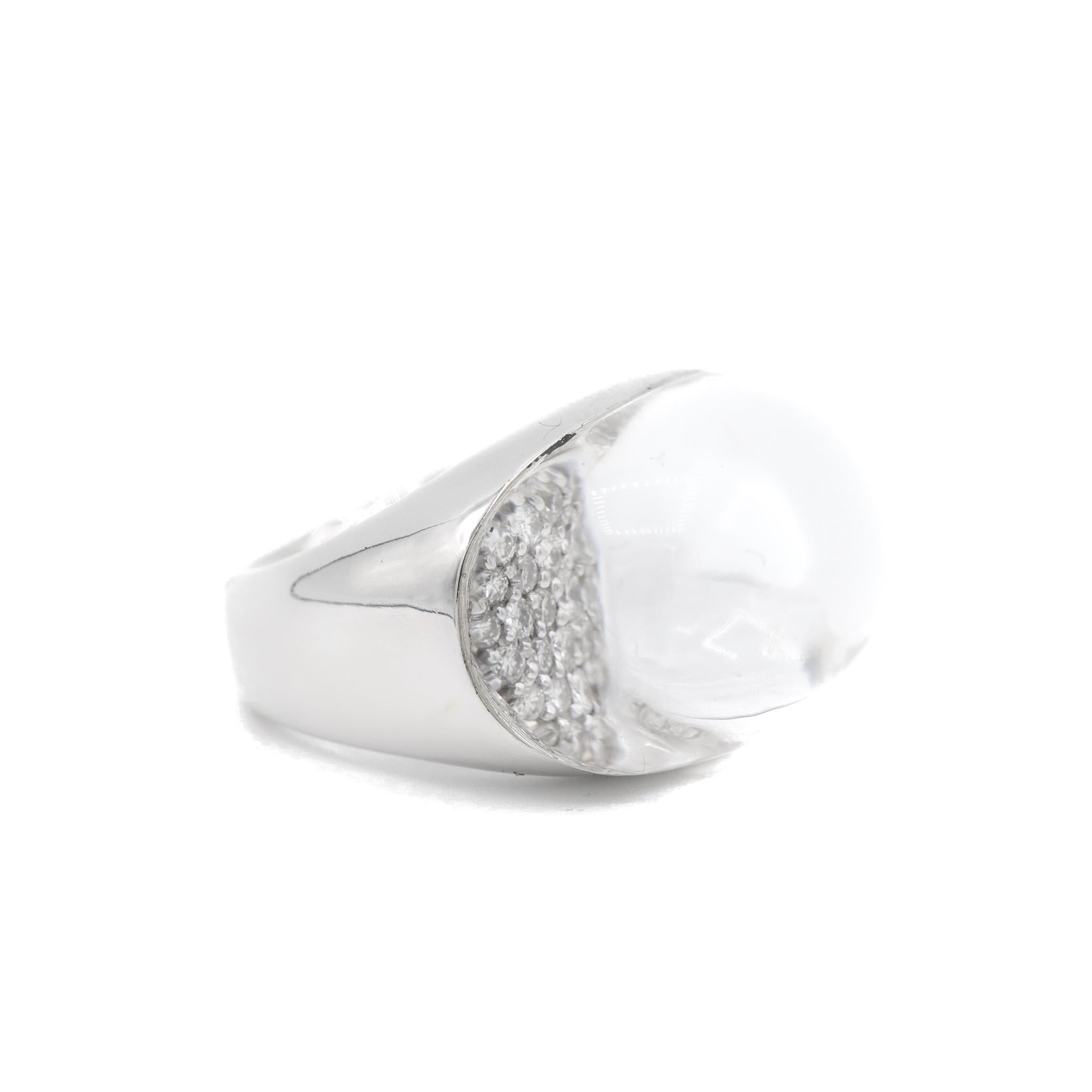 Gender: Ladies

Metal Type: 18K White Gold

Size (US): 6.25

Weight: 20.90 grams

18K white gold diamond cocktail birthstone ring with a comfort-fit shank.

Engraved with 