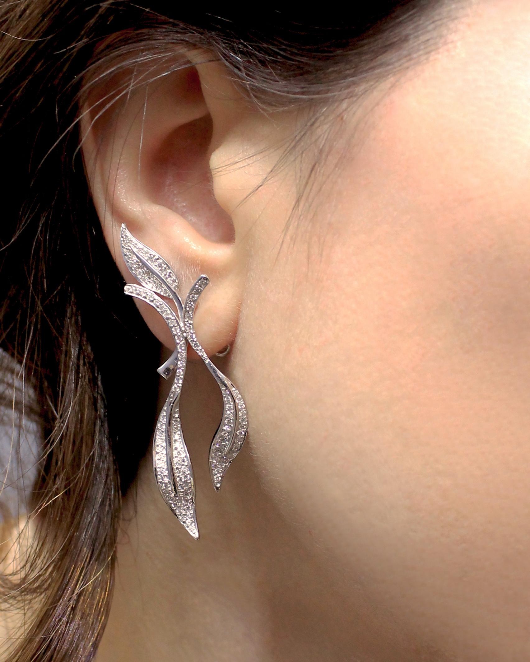 These Earrings are made in 18K White Gold and Diamonds ( see below technical features). 
Currently made by order manufacturing period time will be 1 month.

Contemporary 18K White Gold
Technical features: 
239 Diamonds, Total weight of Diamonds: