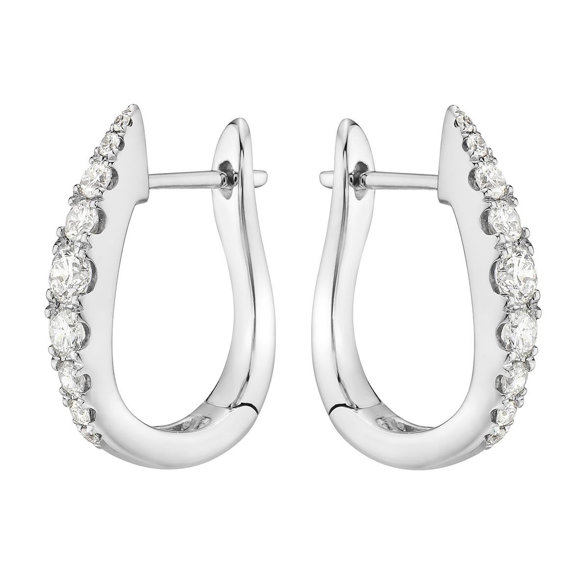 With these exquisite white hoop earrings, style and glamour are in the spotlight. These 18-carat earrings are made from 3.5 grams of gold. These earrings are adorned with VS2, G color diamonds, made out of 18 diamonds totaling 0.55 carats.