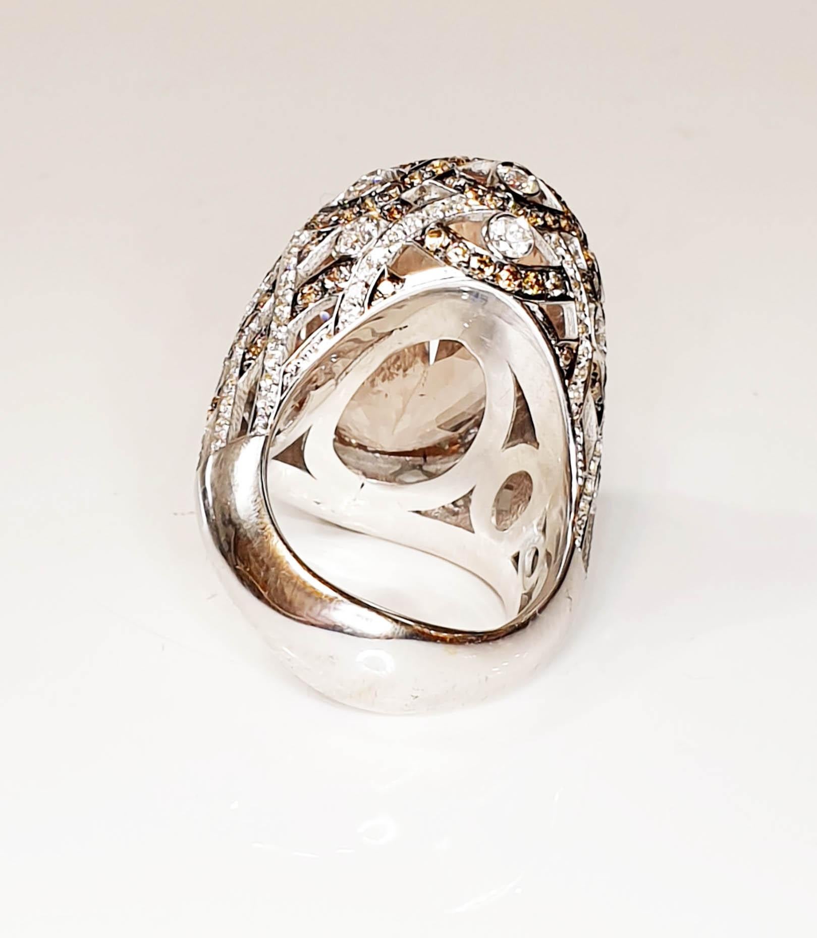 Multifaceted 25ct Morganite  with Brown and white  Diamonds in 18k white gold ring
Irama Pradera is a vdynamic and outgoing designer from Spain that searches always for the best gems and combines classic with contemporary mounting and