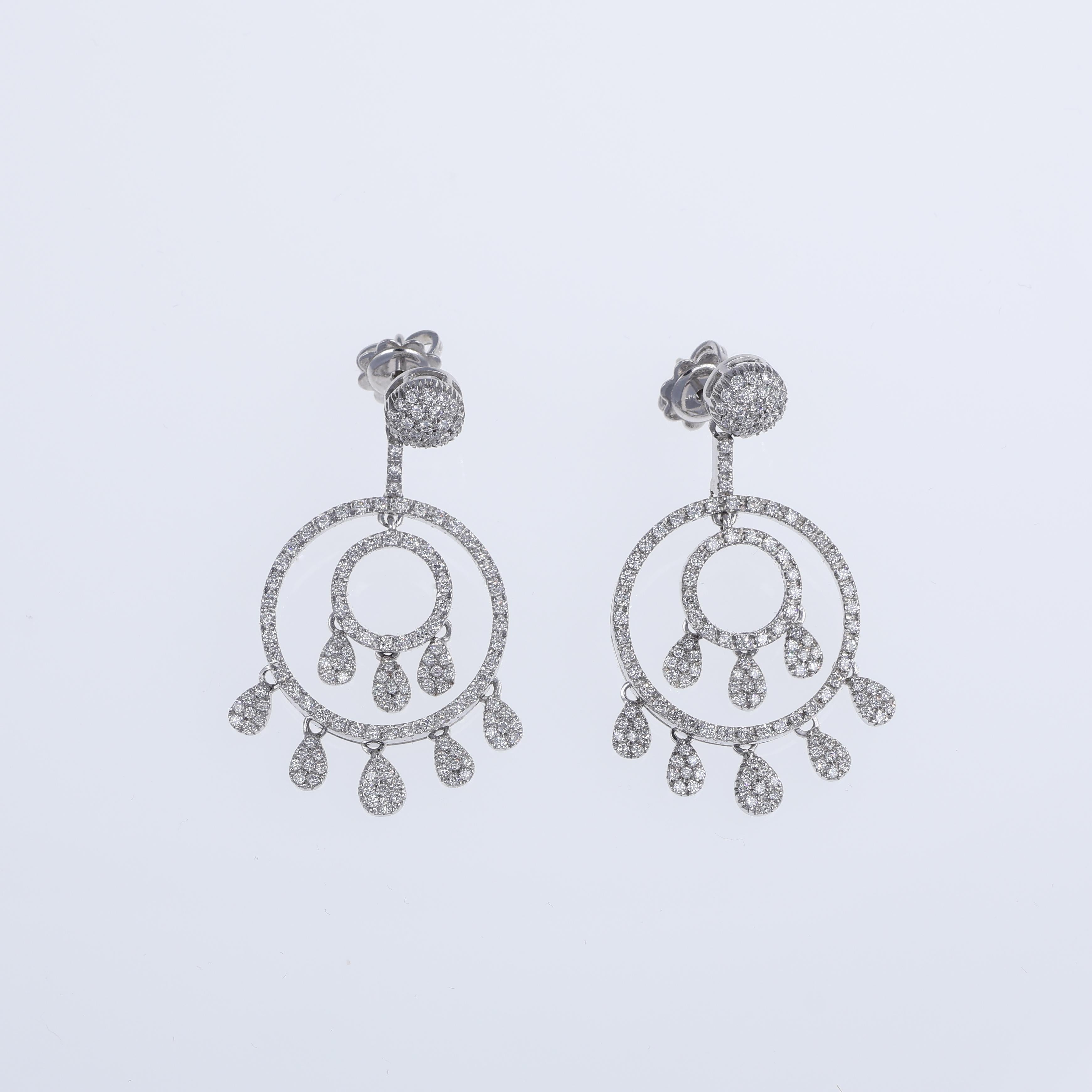 An exquisite pair of 18K white gold drop earrings featuring a double circle design adorned with natural white diamonds. The earrings are accented with teardrop-shaped pendants, adding elegance and movement to the design. With a total diamond weight