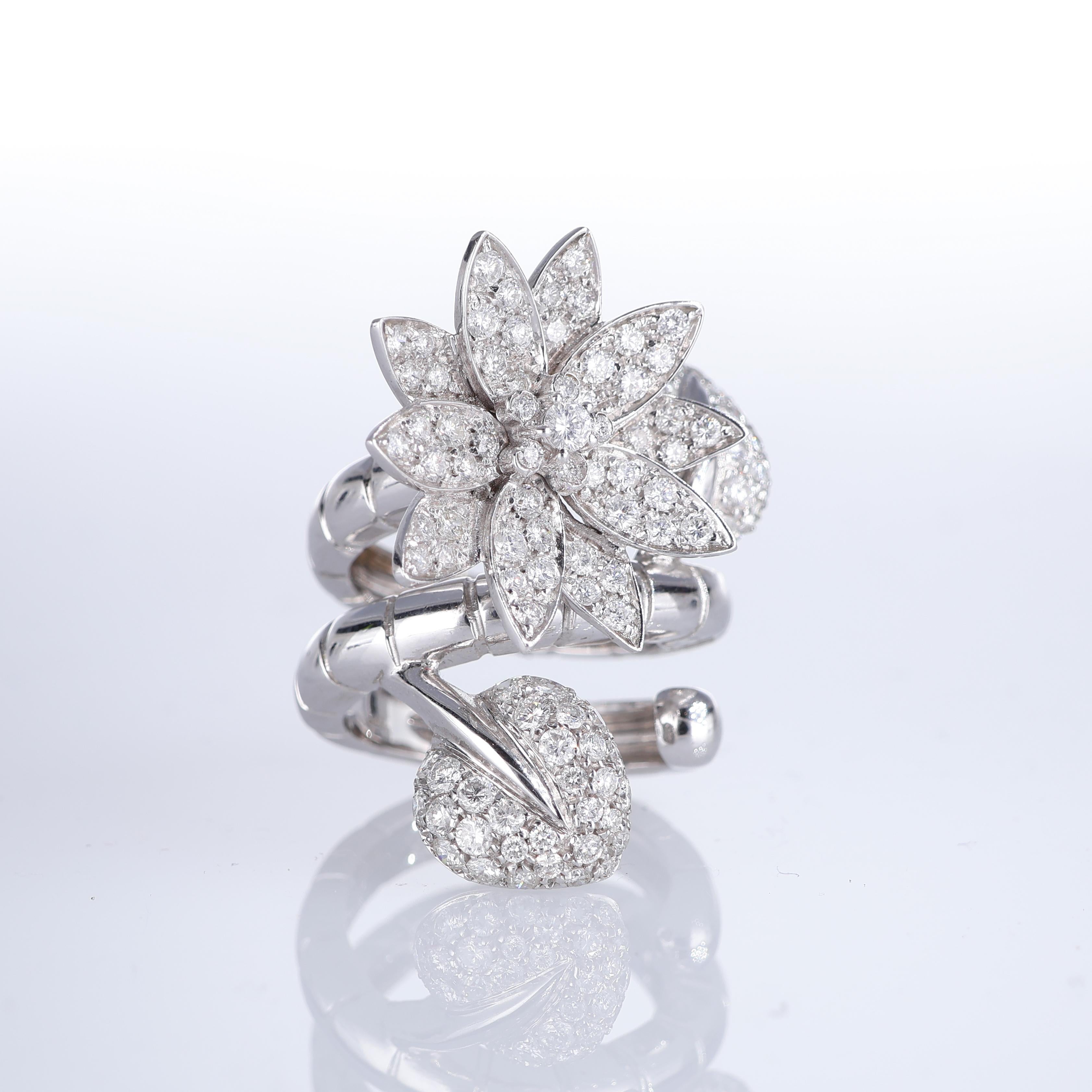 IMPORTANT NOTE:
✔ No additional costs will be added to this order.
✔ Shipping and customs duties are fully covered by us.
--------------------
An extraordinary double-finger ring crafted in 18K white gold, featuring an exquisite flower and leaf