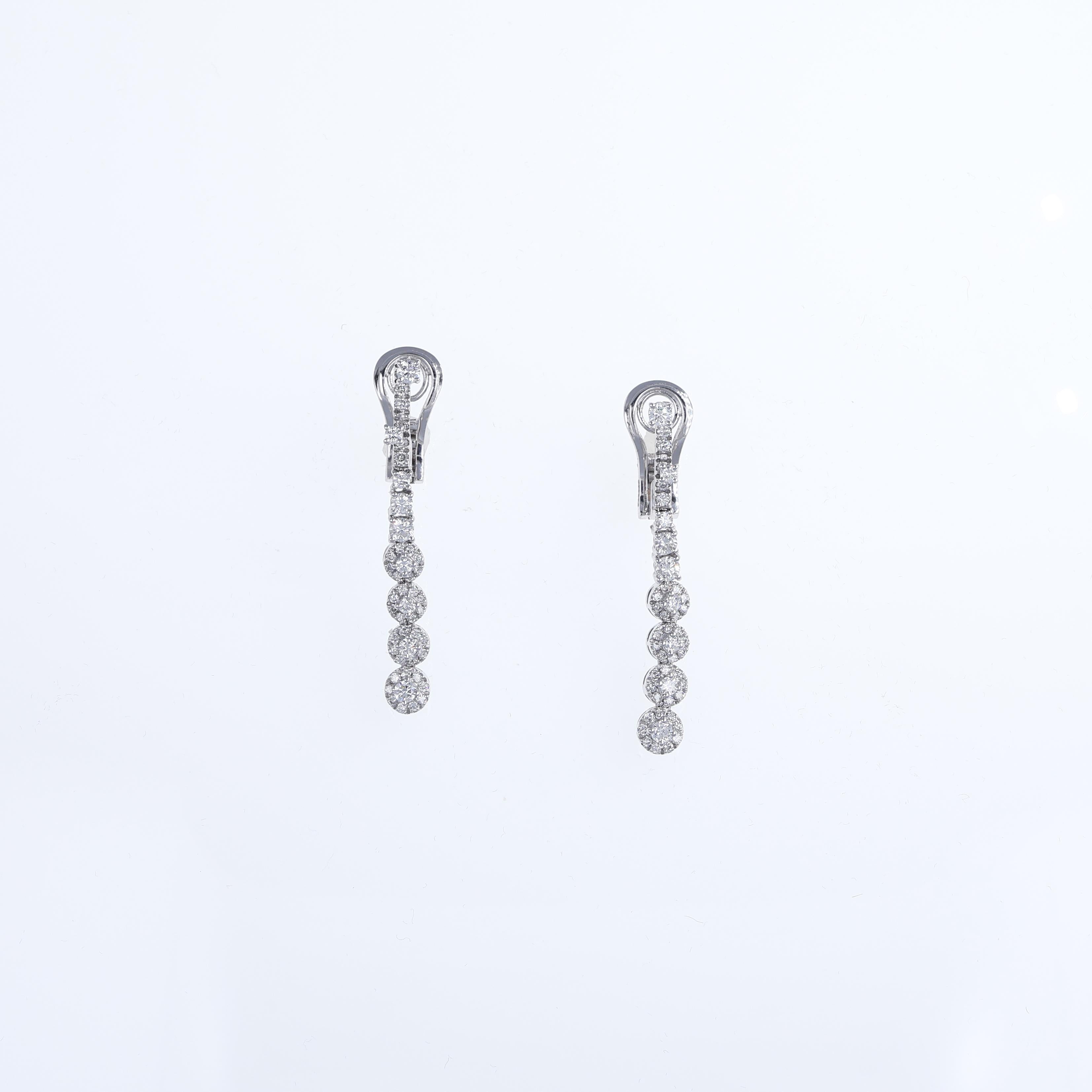 A refined pair of drop earrings crafted in 18K white gold, featuring a sleek and timeless design. Adorned with natural brilliant-cut diamonds totaling 1.32 carats, these earrings exude elegance and sophistication. Perfect for adding a subtle yet