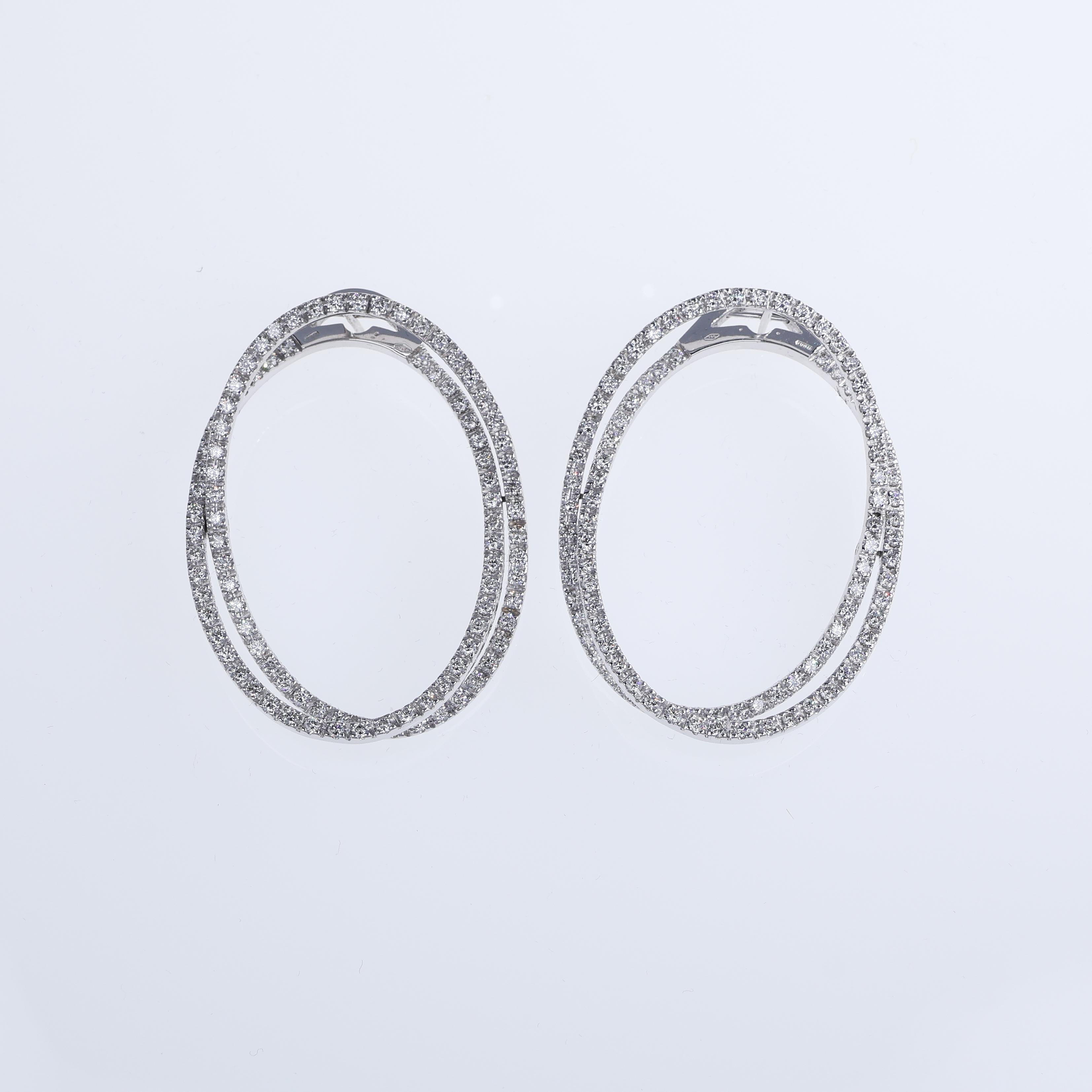 IMPORTANT NOTE:
✔ No additional costs will be added to this order.
✔ Shipping and customs duties are fully covered by us.
--------------------
A sophisticated pair of drop earrings crafted in 18K white gold, featuring an intricate overlapping design