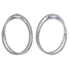 Boucles d'oreilles en or blanc 18 carats avec 3,42 carats de diamants