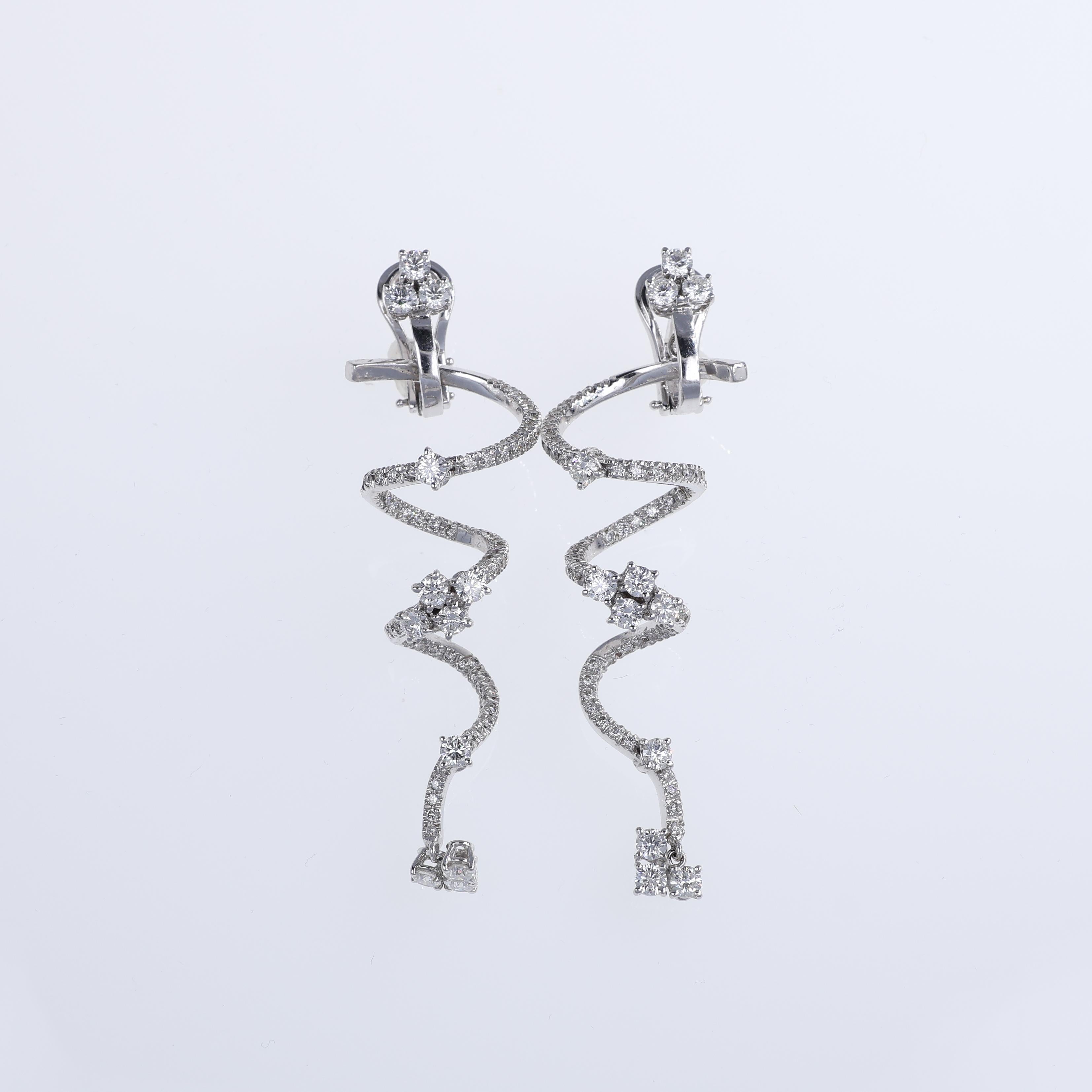 IMPORTANT NOTE:
✔ No additional costs will be added to this order.
✔ Shipping and customs duties are fully covered by us.
--------------------
An elegant pair of drop earrings crafted in 18K white gold, showcasing a dynamic and flowing design