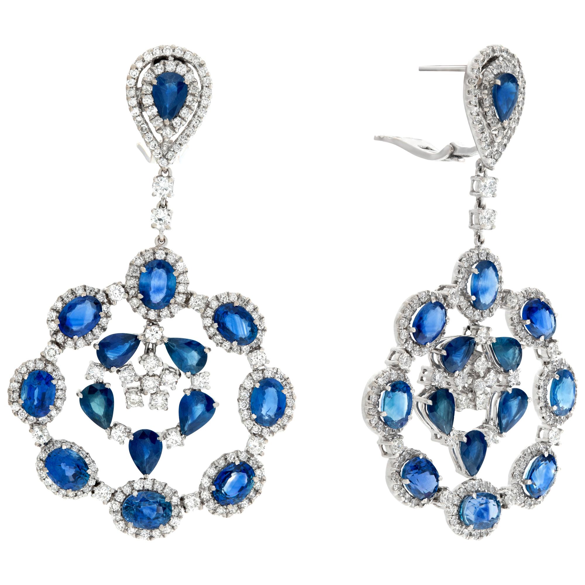 Splendid diamond and sapphire chandelier earrings in 18k white gold; 6.71 carats in round brilliant cut diamonds and 29.52 cts in oval & pear cut deep blue sapphires. 70mm length x 41 mm width.
