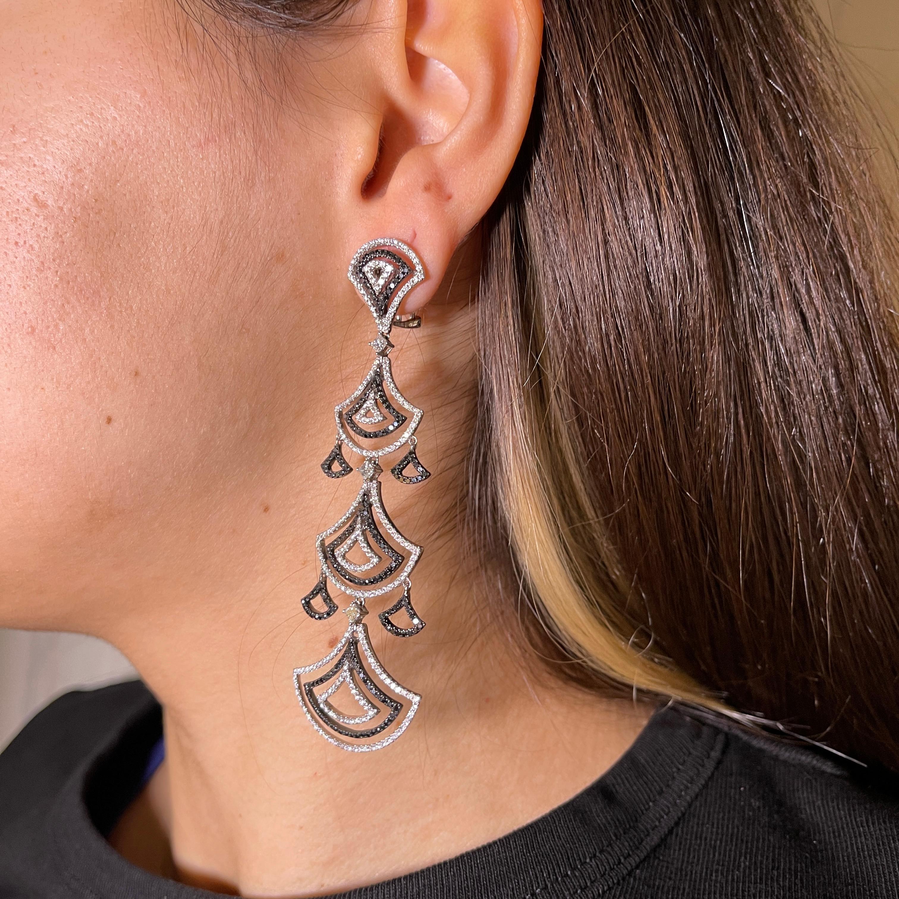 IMPORTANT NOTE:
✔ No additional costs will be added to this order.
✔ Shipping and customs duties are fully covered by us.
--------------------
An extraordinary pair of drop earrings crafted in 18K white gold, featuring a bold geometric design